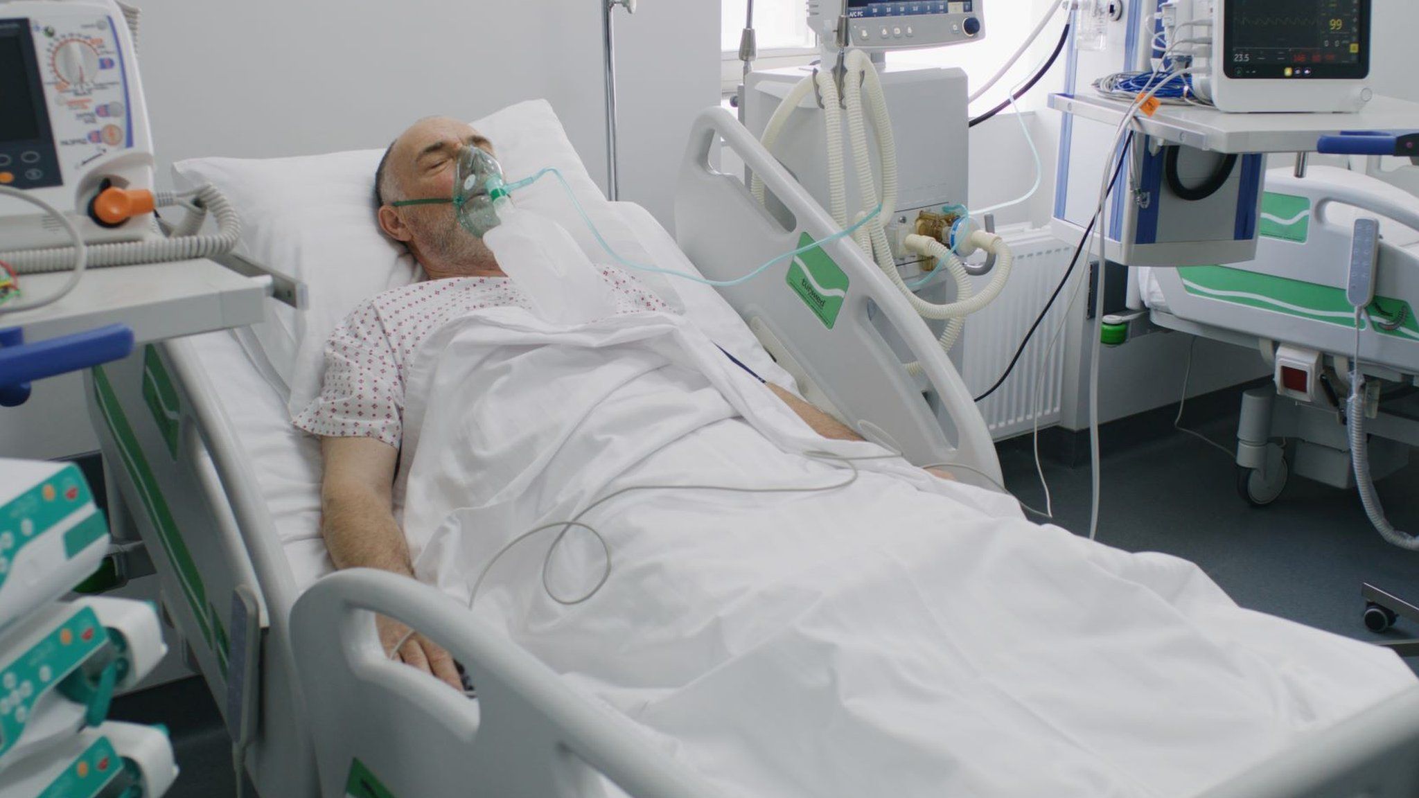 Sick man on ventilator