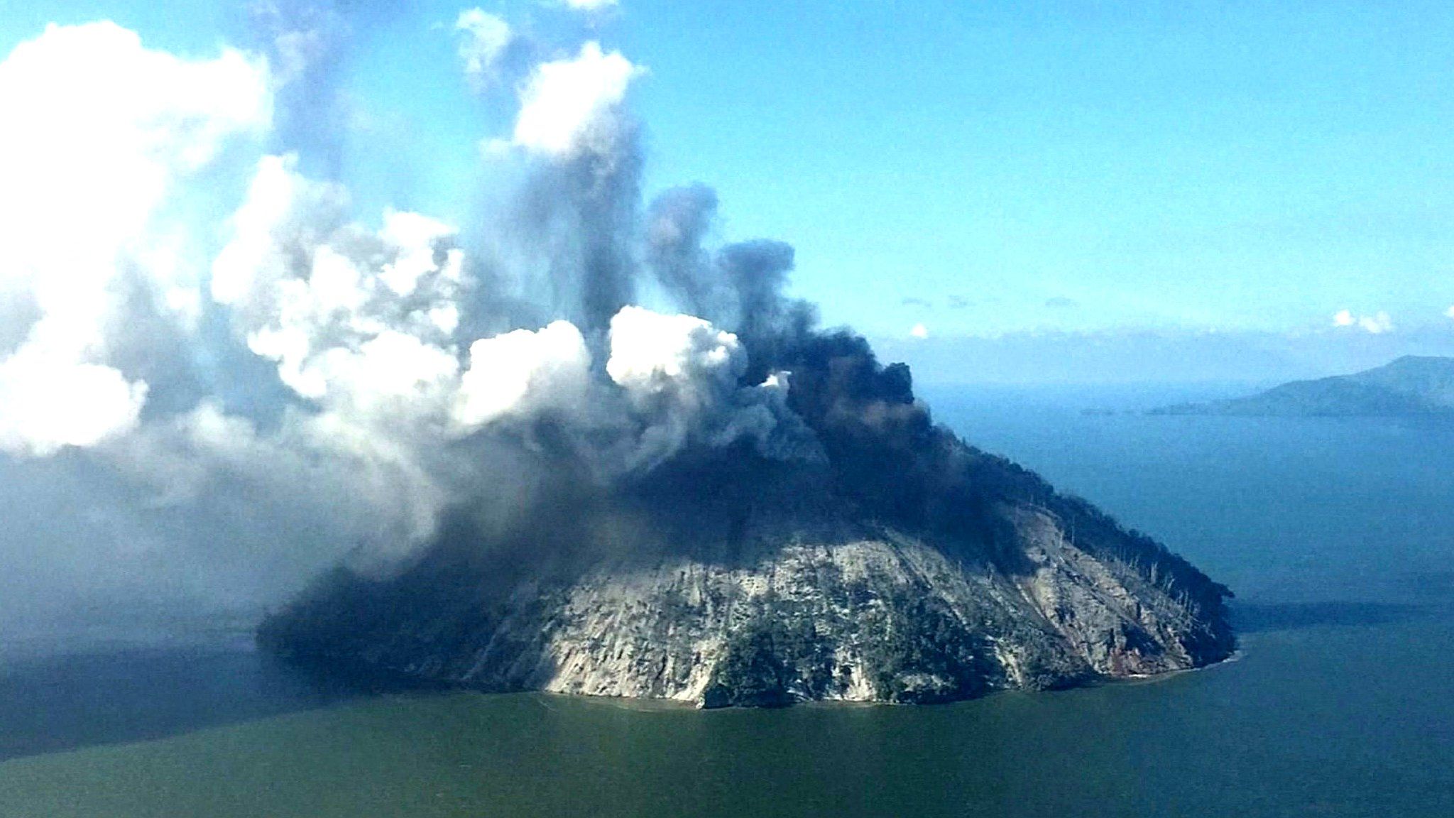The remote island volcano of Kadovar spews ash into the sky in Papua New Guinea, January 6, 2018
