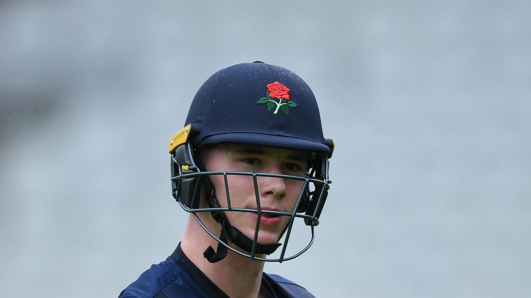 Rocky Flintoff leaves the field after scoring 88 for Lancashire