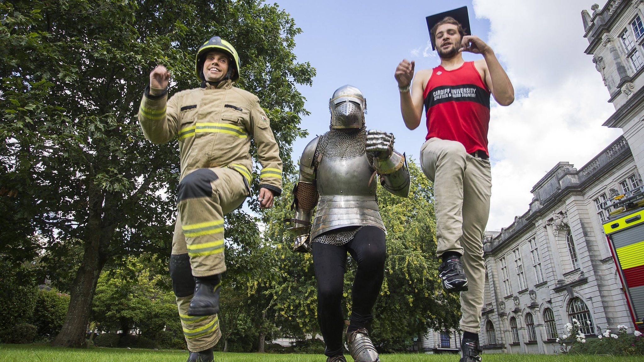 A photo of Firefighter Kevin Summerhayes, Sir Runalot, and Alec Care