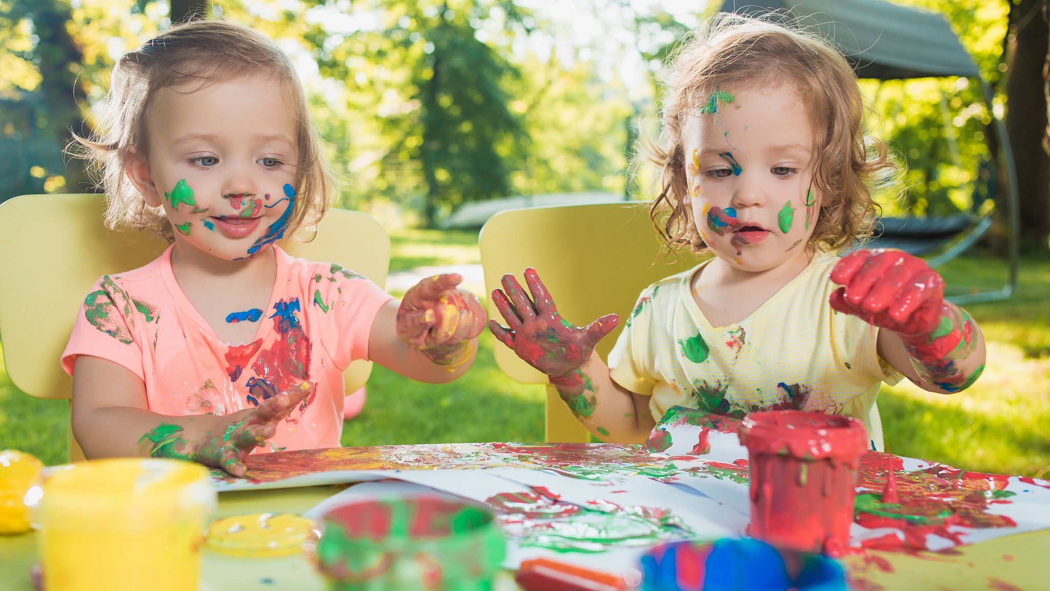 Children painting in a nursery