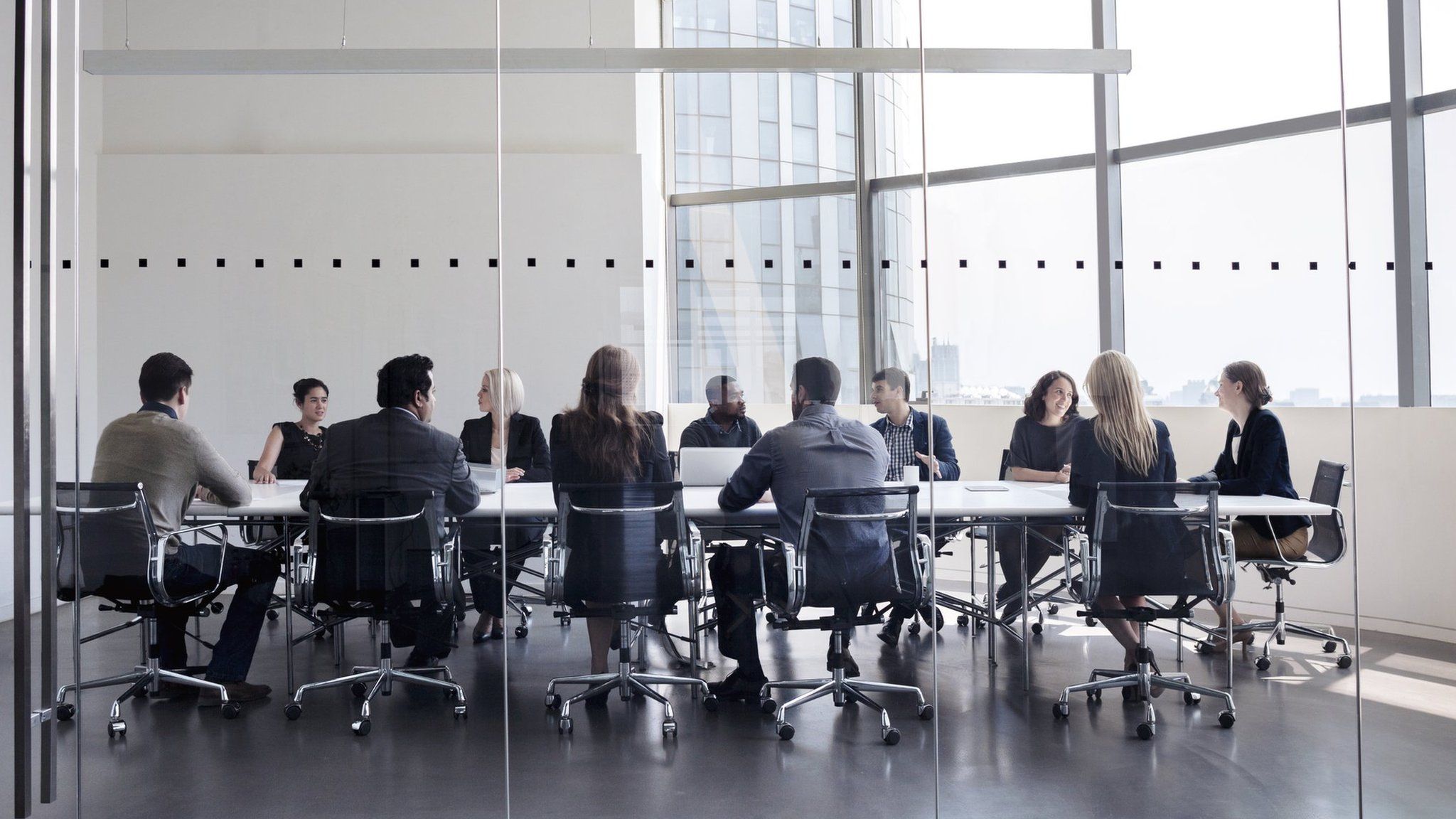 Men and women in a meeting