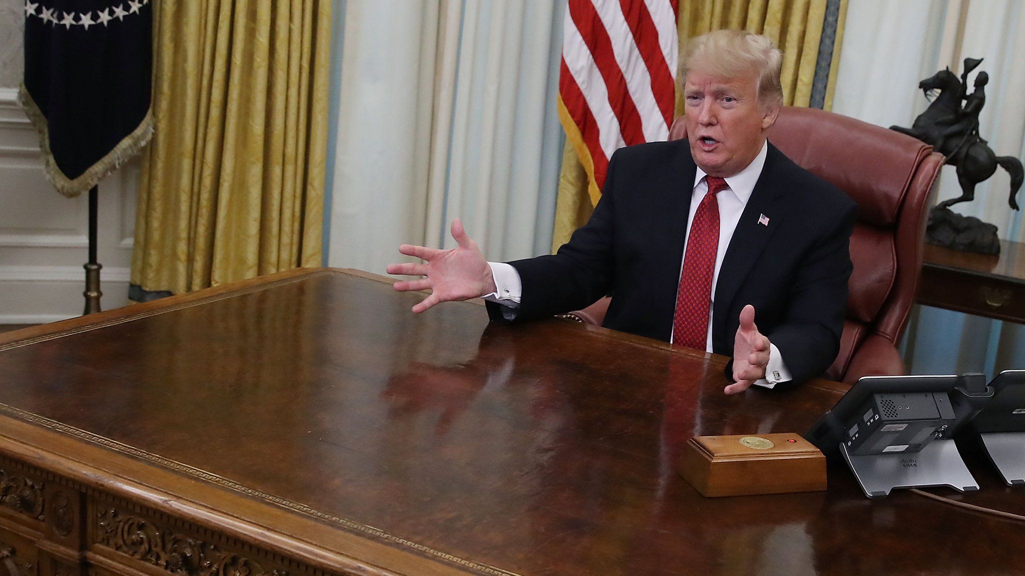 U.S. President Donald Trump speaks during a meeting with Chinese Vice Premier Liu He, in the Oval Office at the White House on January 31, 2019
