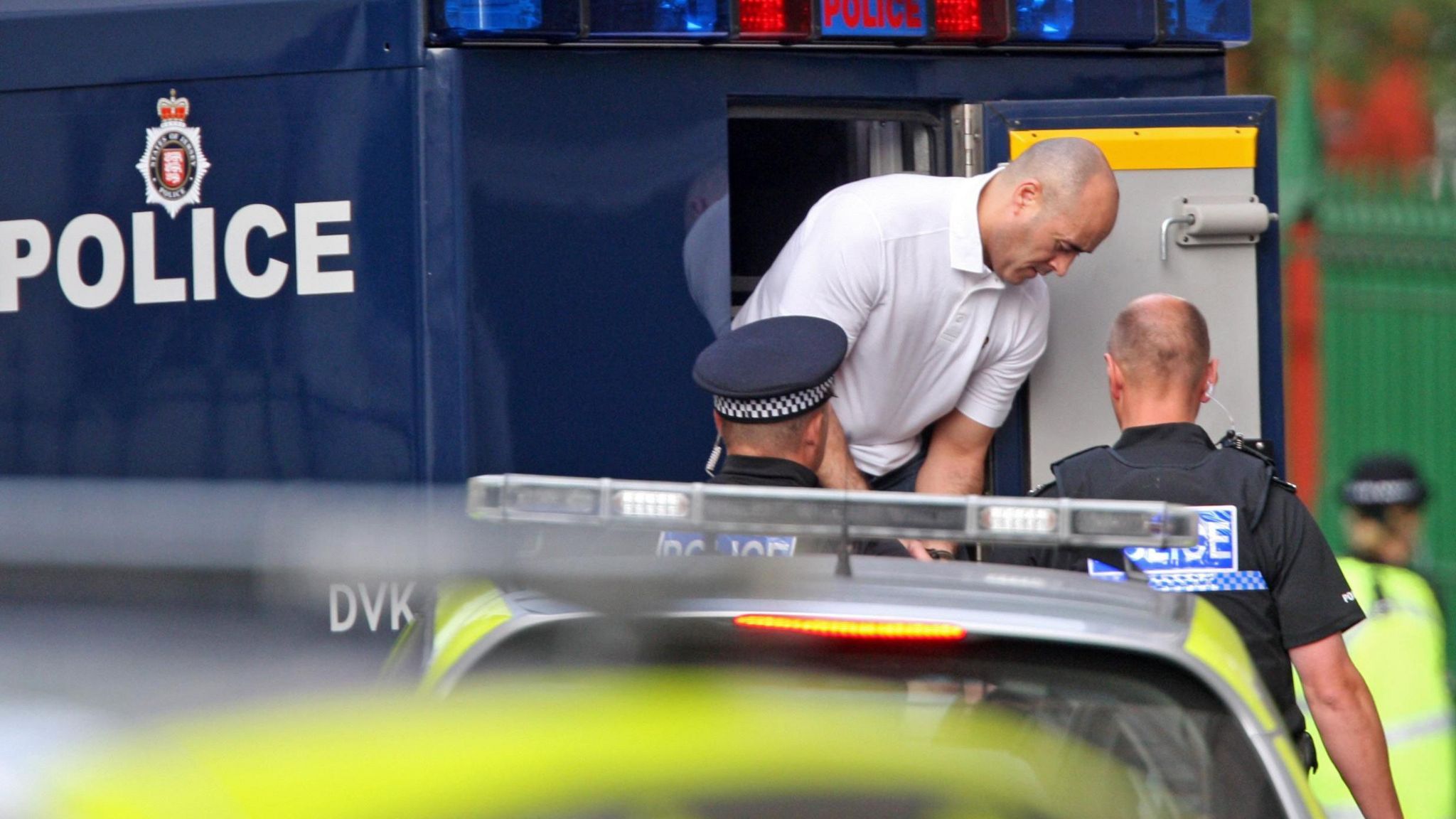 Curtin Warren being arrested