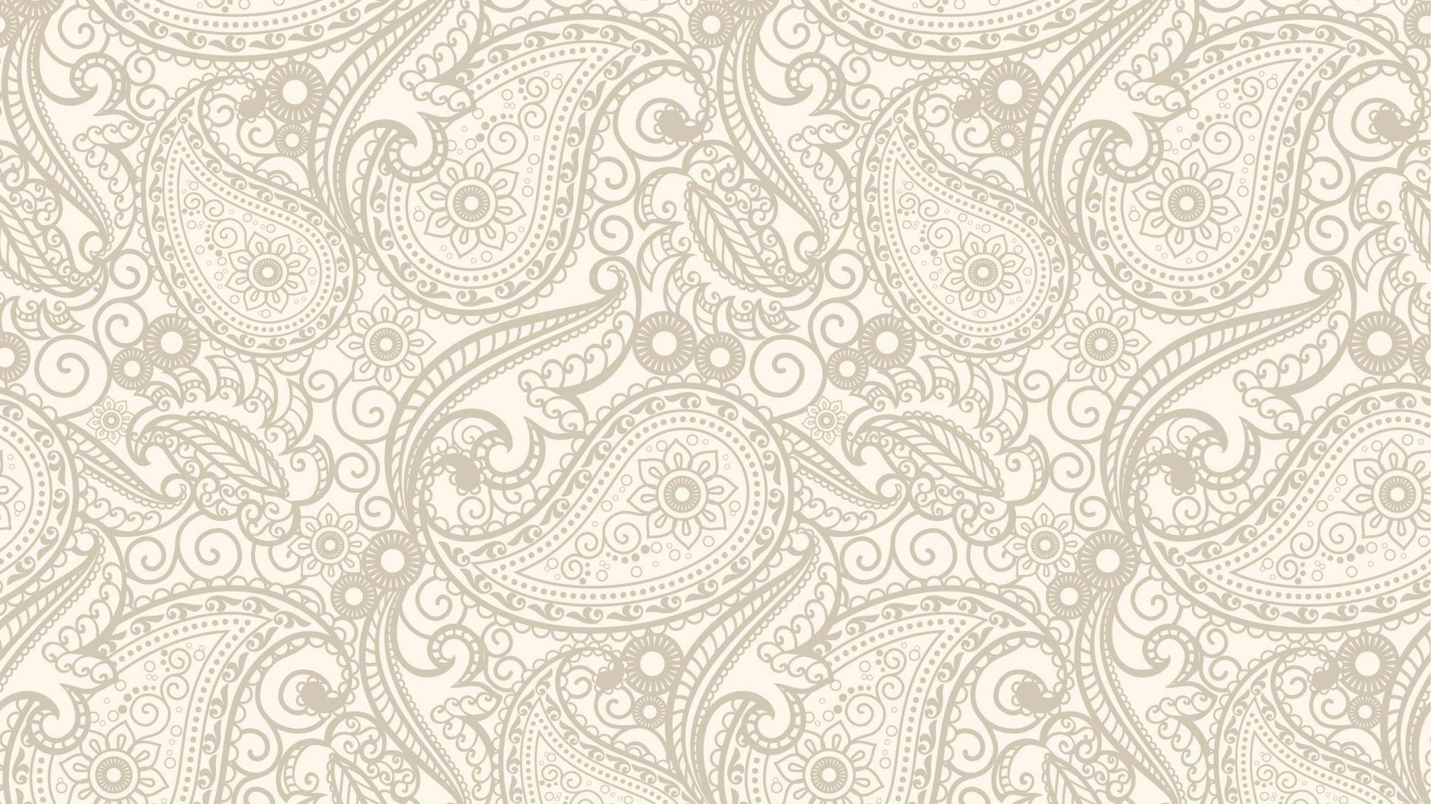 Gold and cream swirling and floral paisley pattern
