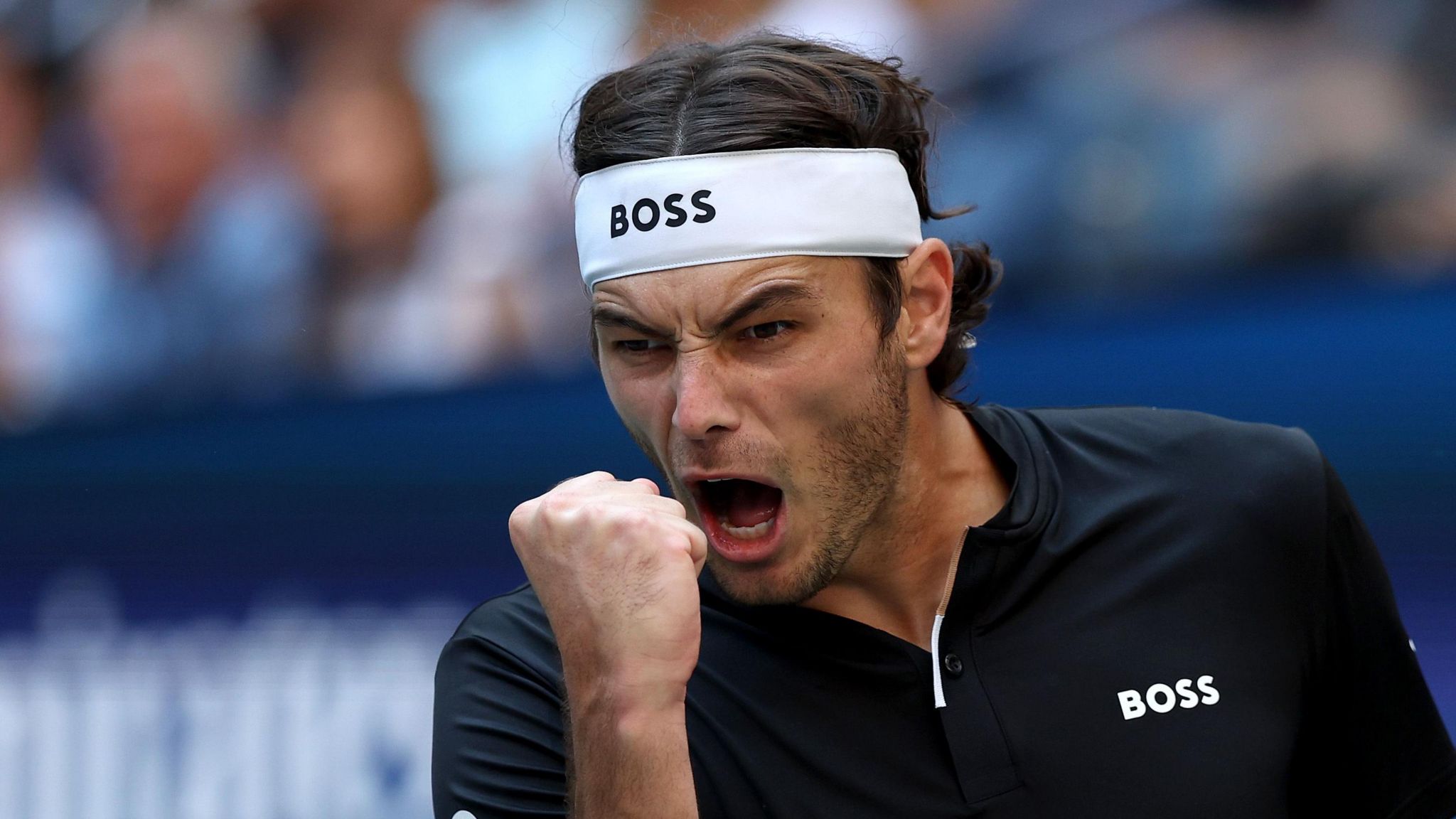 Taylor Fritz celebrates a point