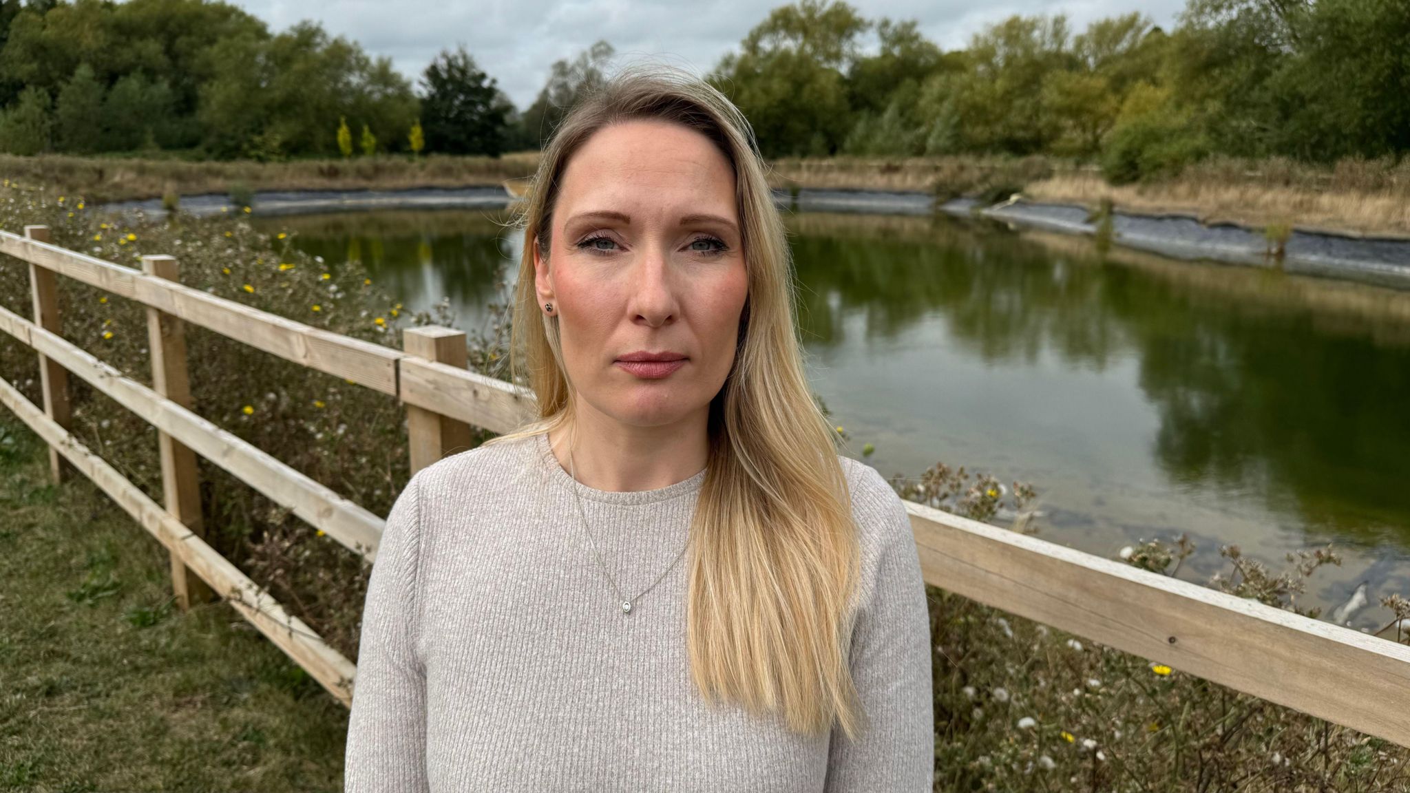 Lorna Trueman is pictured next to the new lagoon