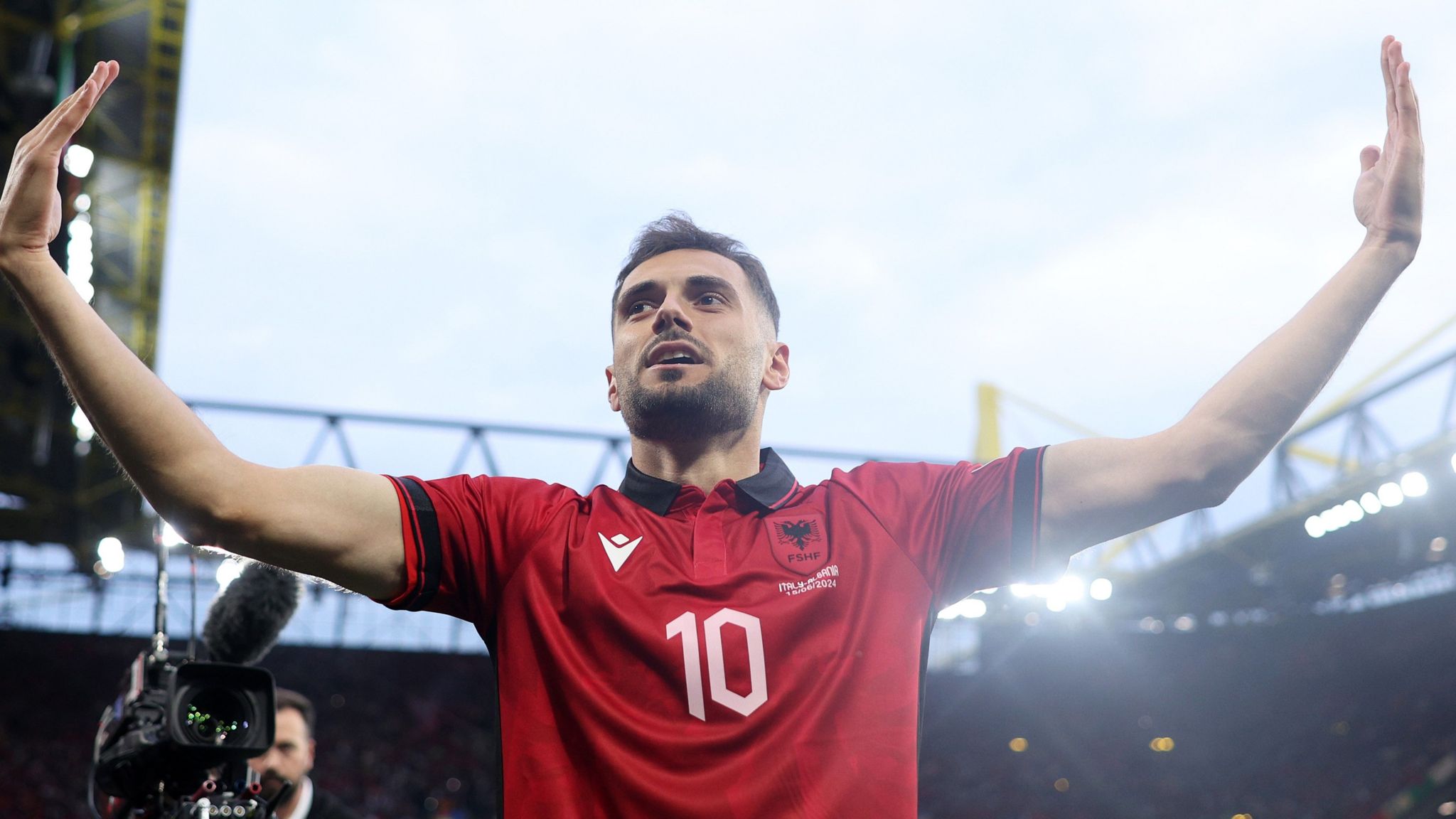 Nedim Bajrami celebrates scoring for Albania