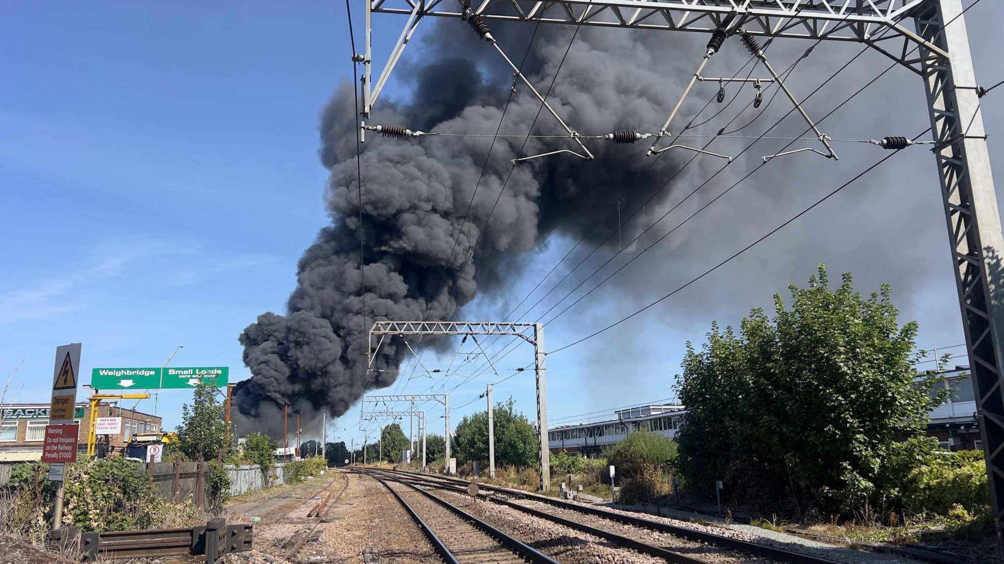 The large smoke plume could be seen for miles in the area