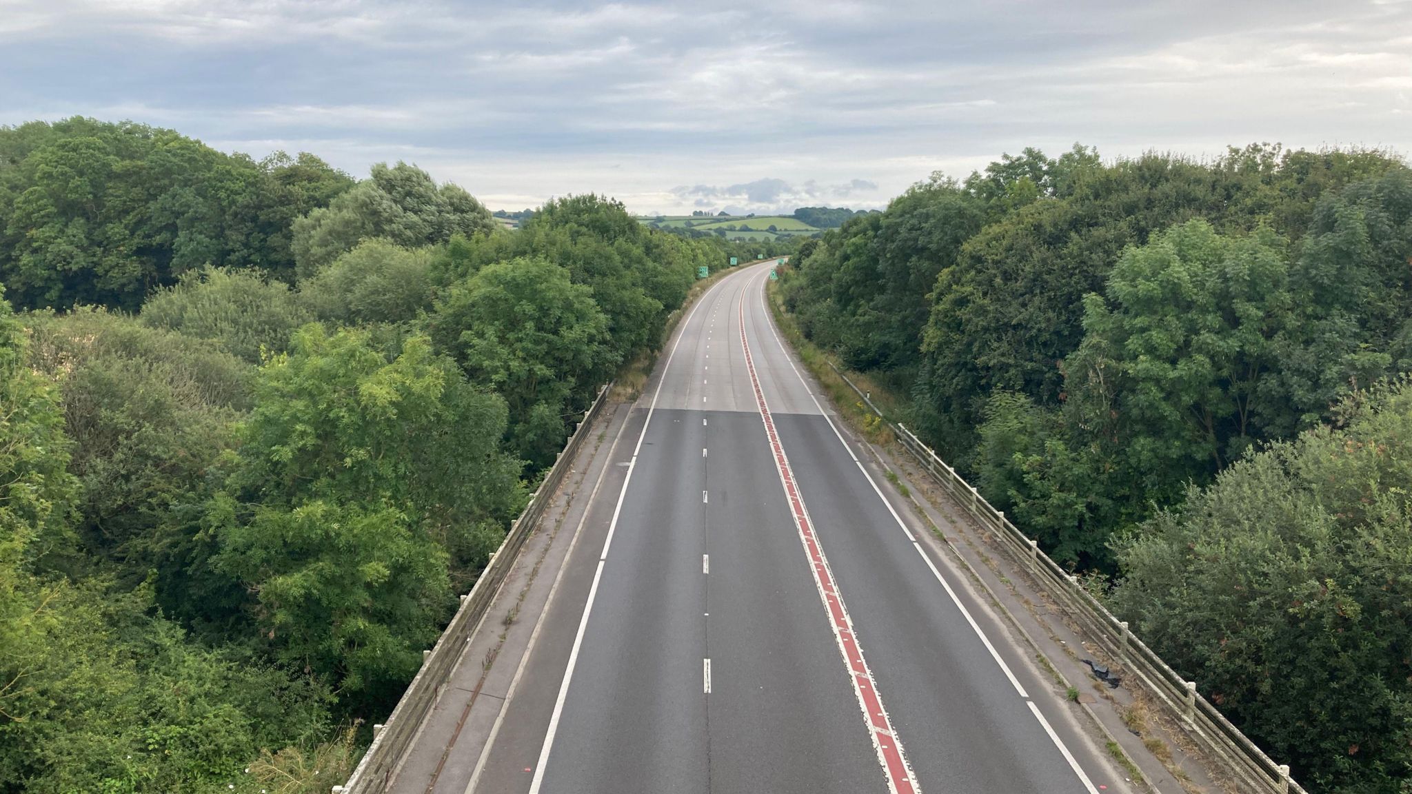 The A303, a rural road with trees on either side