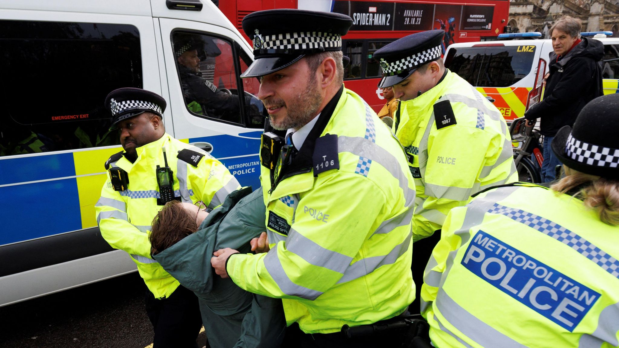 Met Police officers remove a protester during a Just Stop Oil protest at Westminster in London on 30 October 2023