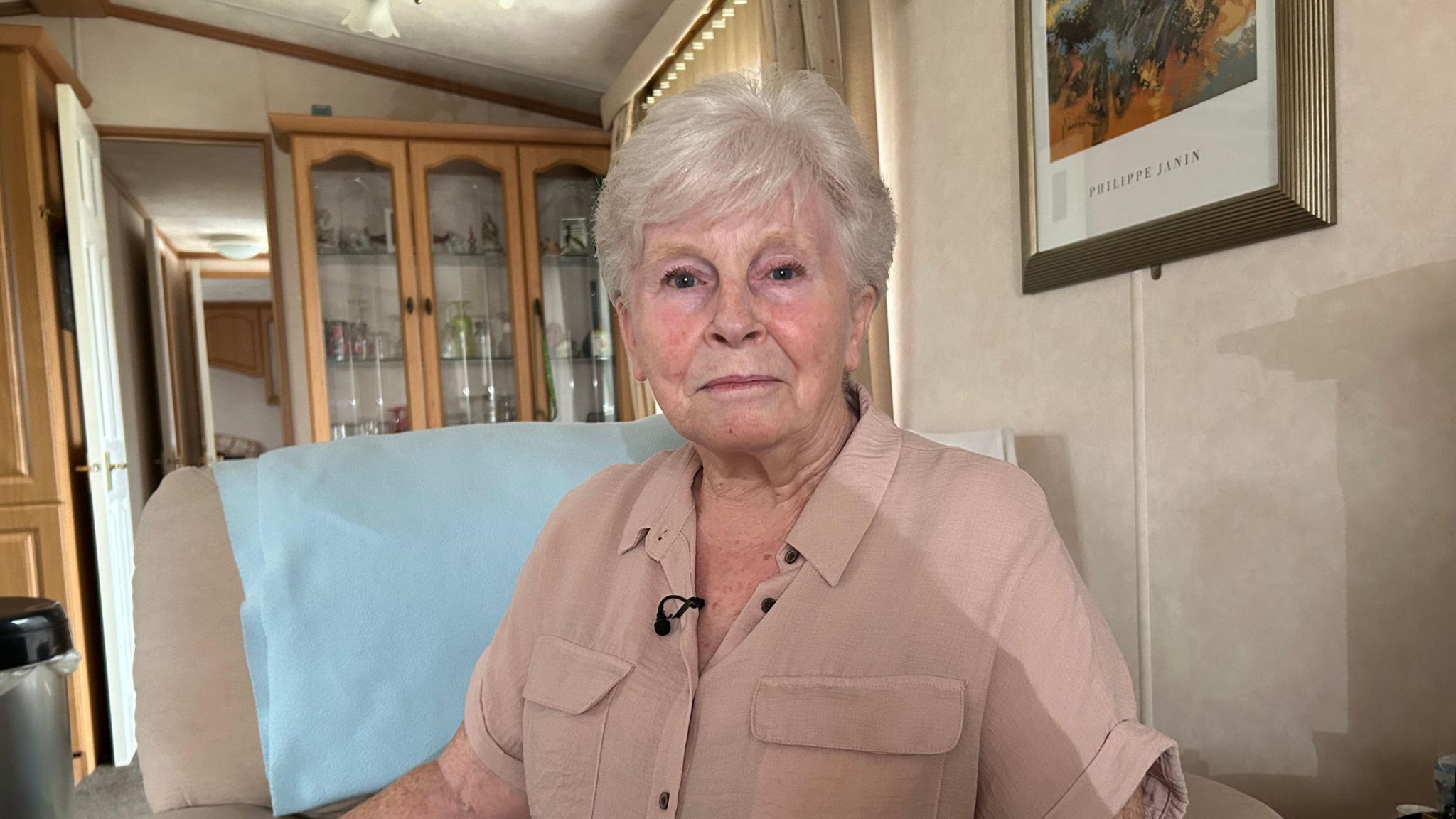 Margaret Smith sitting down and looking at the camera