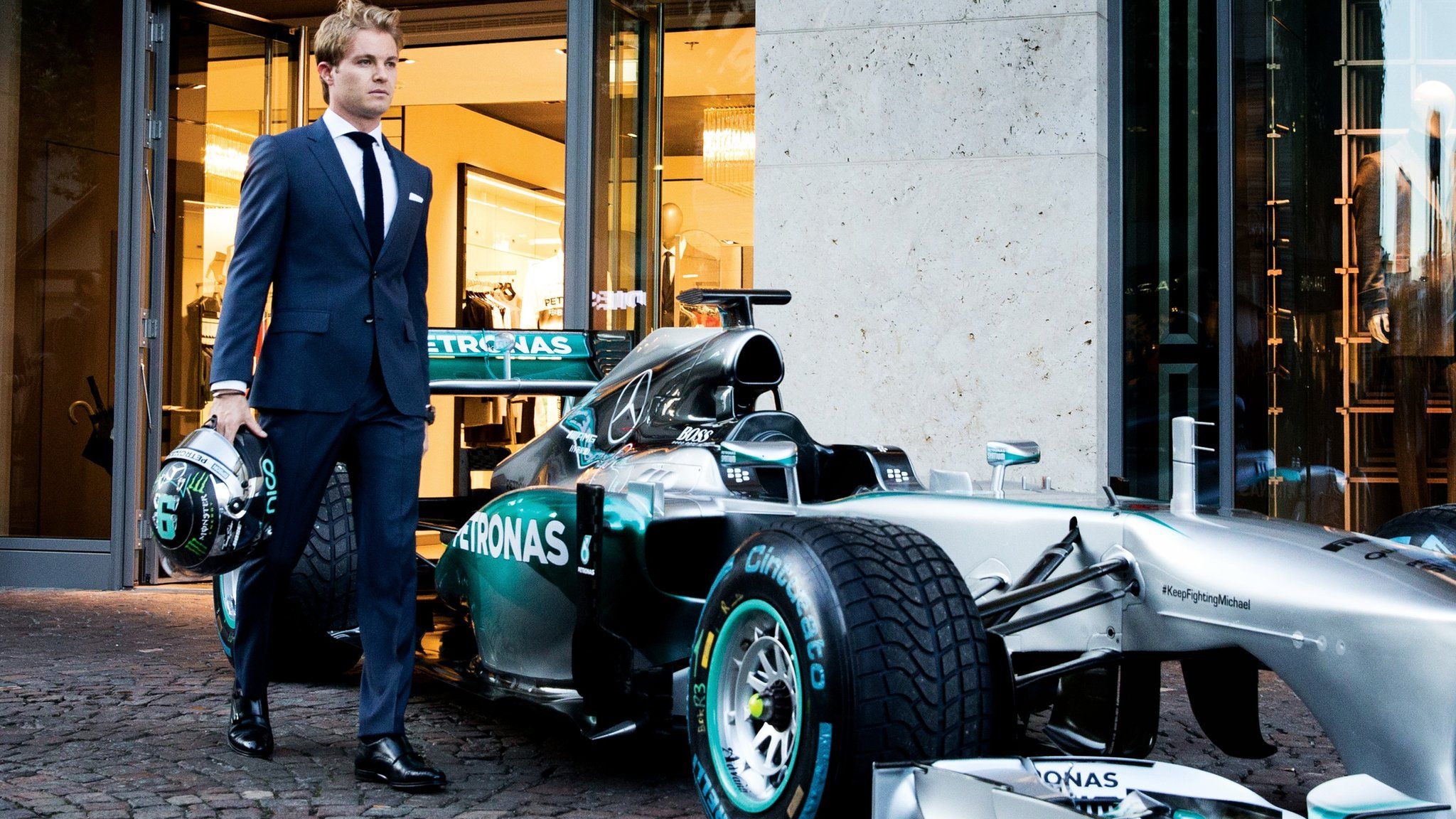Nico Rosberg walking on cobbles
