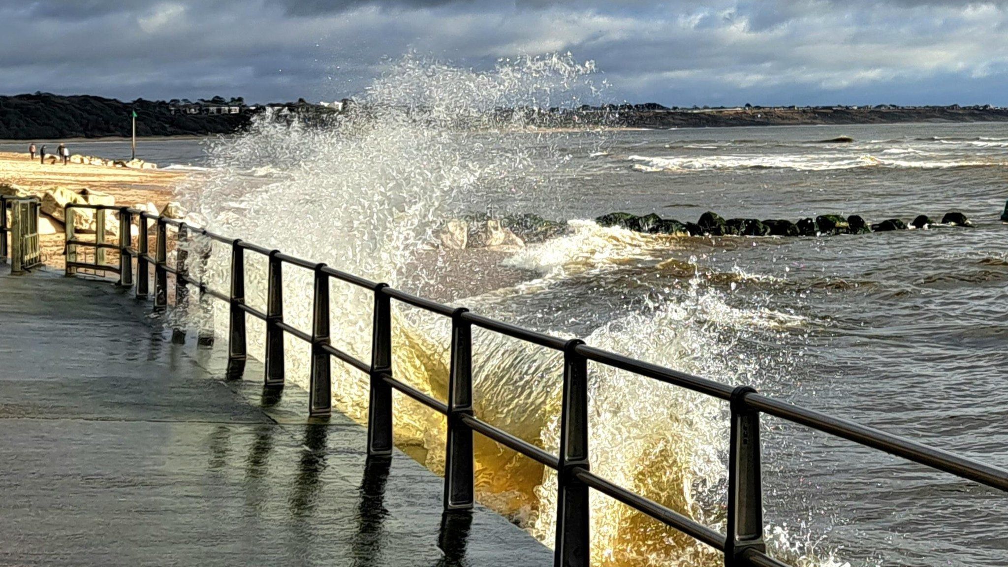 This dramatic shot of the waves crashing against the promenade in Mudeford was caught on camera by MarkieB