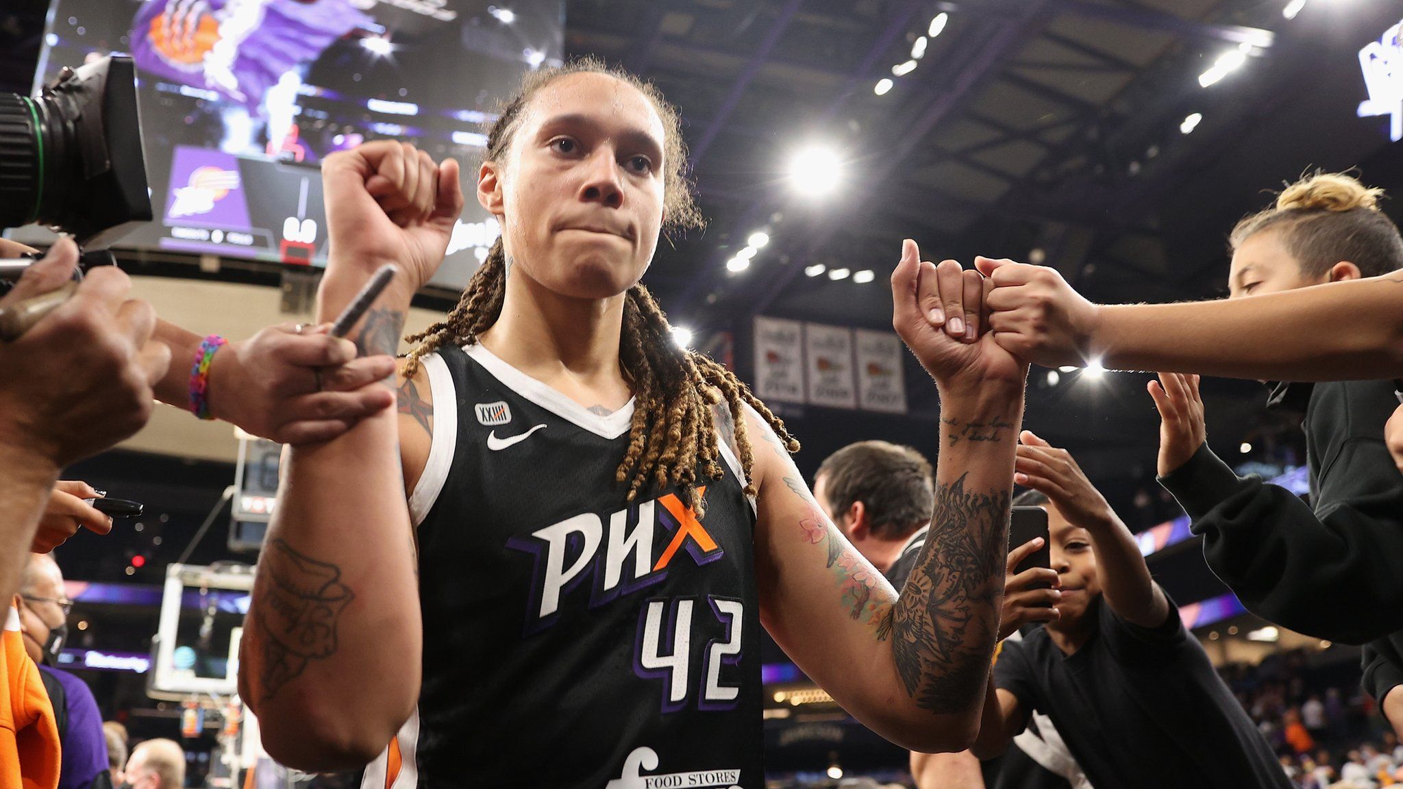 Brittney Griner greets fans at a game