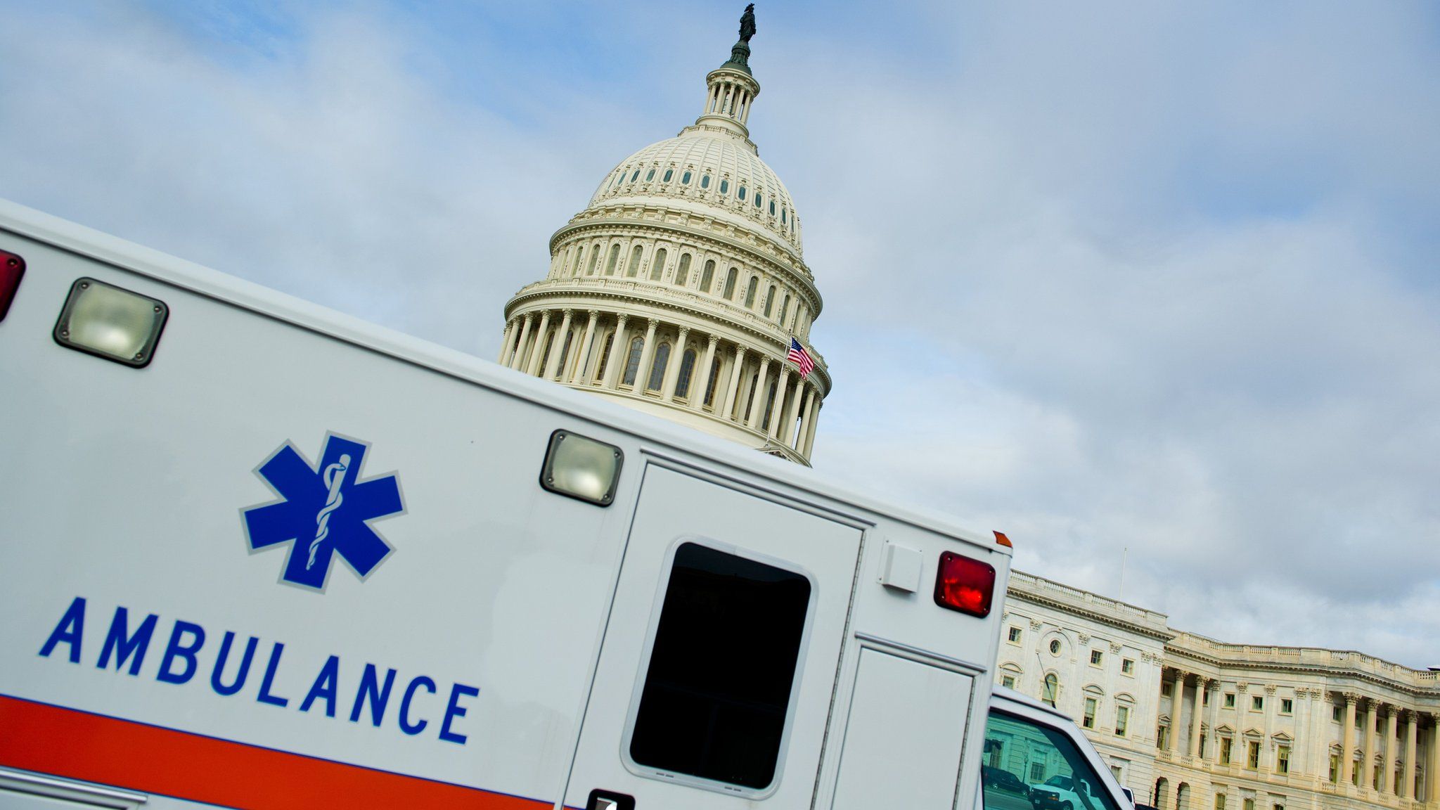 An ambulance is seen in front of the US Capitol October 16, 2013 in Washington, DC.