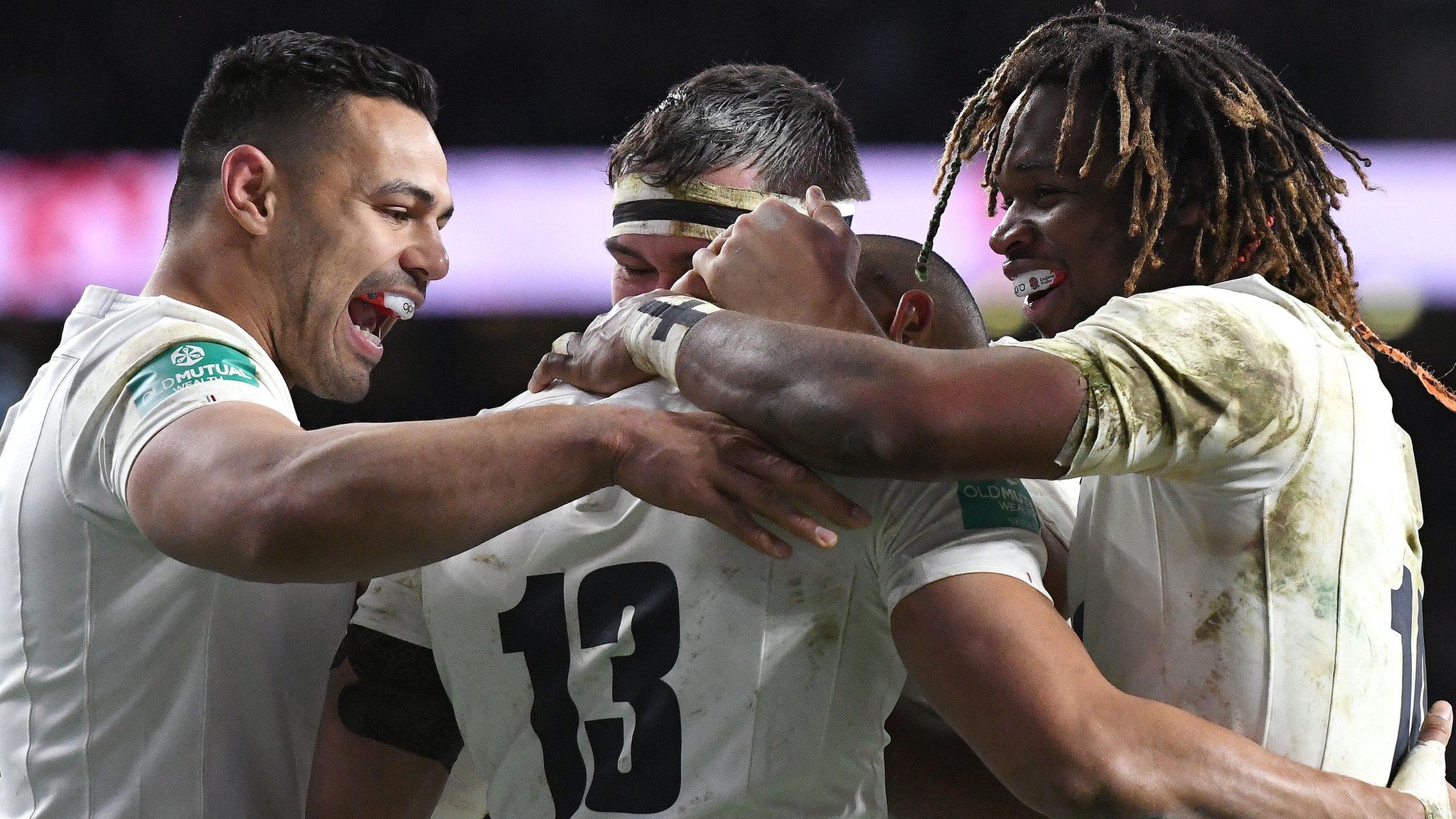 England's Ben Teo'o, Jamie George and Marland Yarde congratulate Jonathan Joseph (13) on his second try in the win over Australia