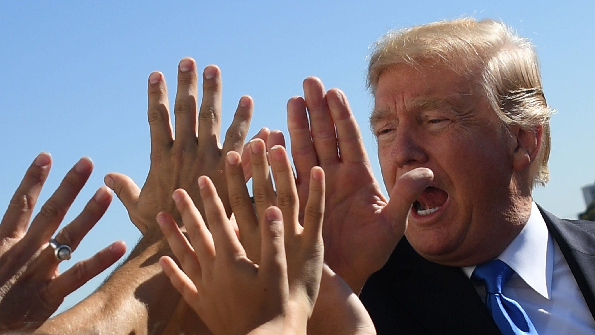 Donald Trump high-fives