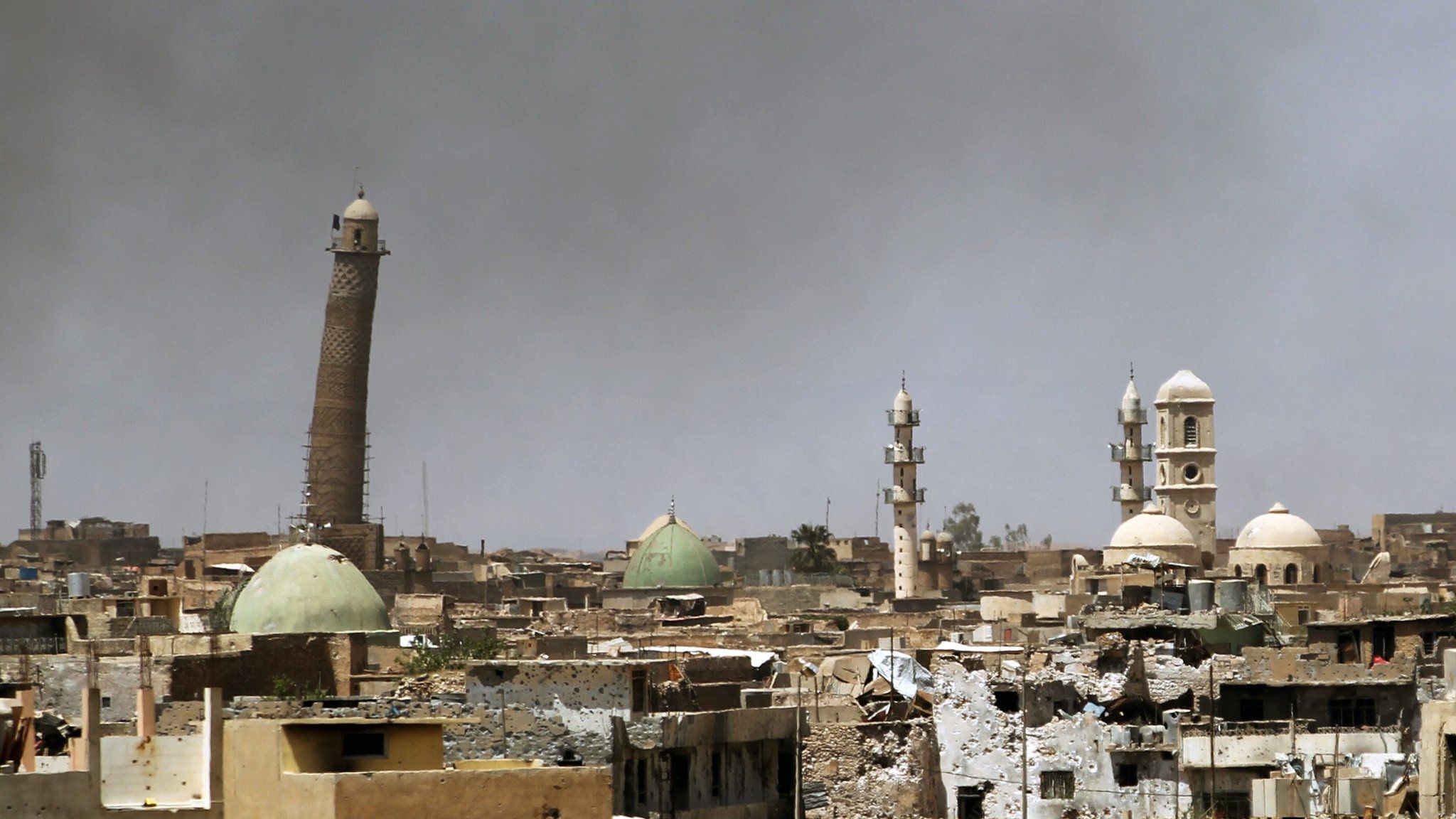 Mosque's minaret (pictured left) in Mosul on 24 May 2017