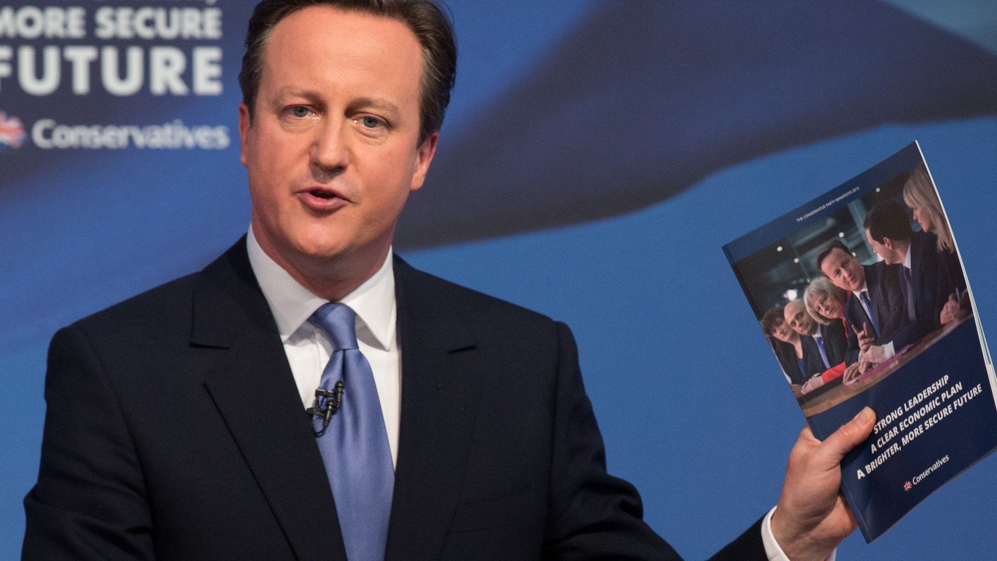 David Cameron with Conservative manifesto 2015