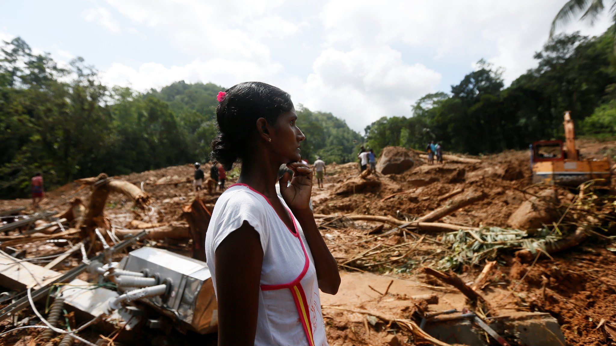 Woman surveys flood wreckage in Kalutara district - 28 May