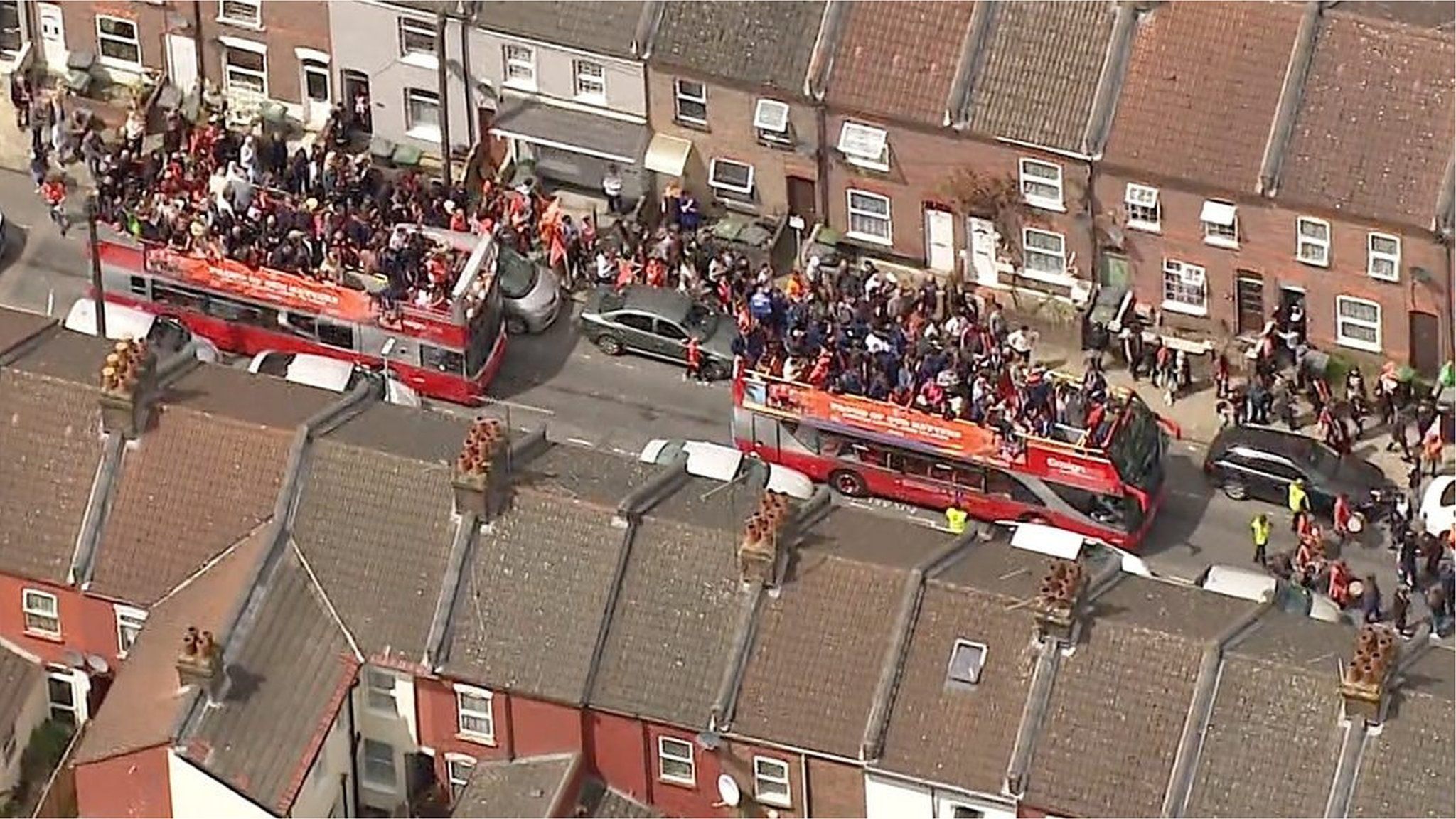 Luton Town open-top bus viewed from helicopter