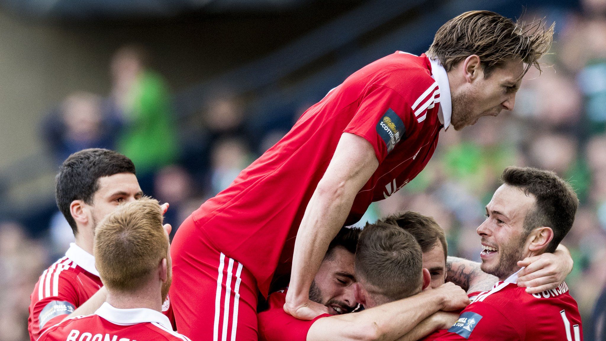 Aberdeen players celebrate a goal