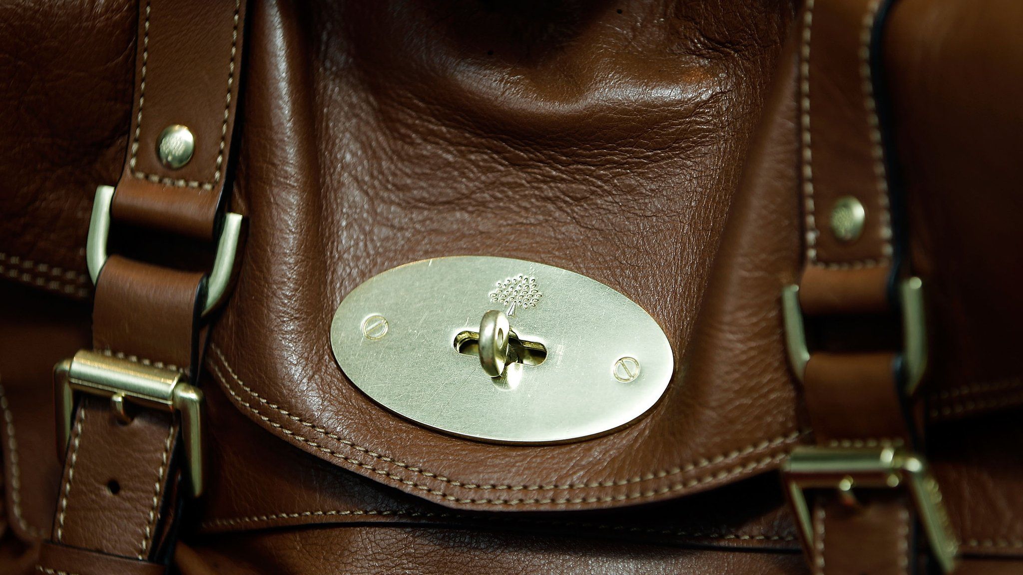 Close up of Mulberry logo on brown bag