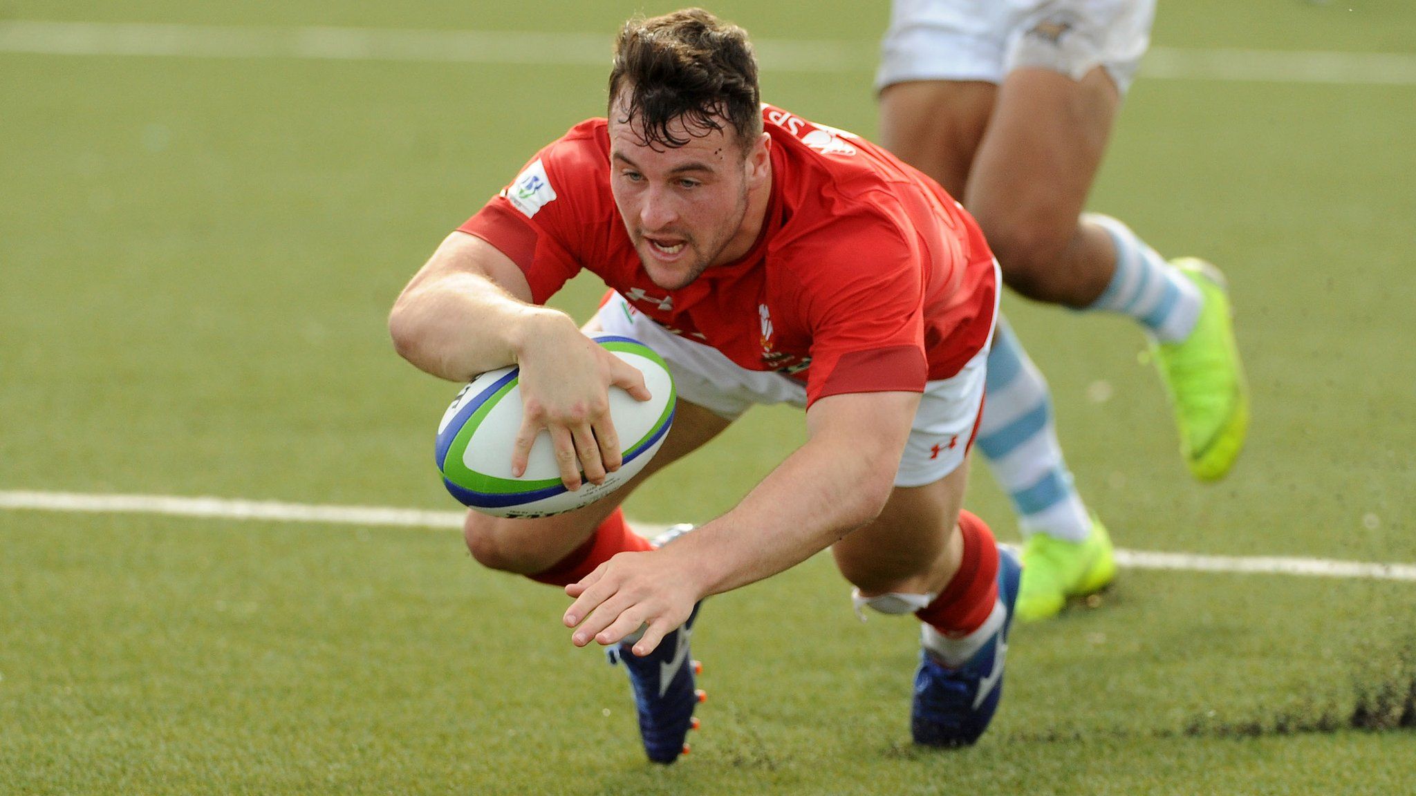 Ryan Conbeer of Wales breaks through to score a decisive second-half try