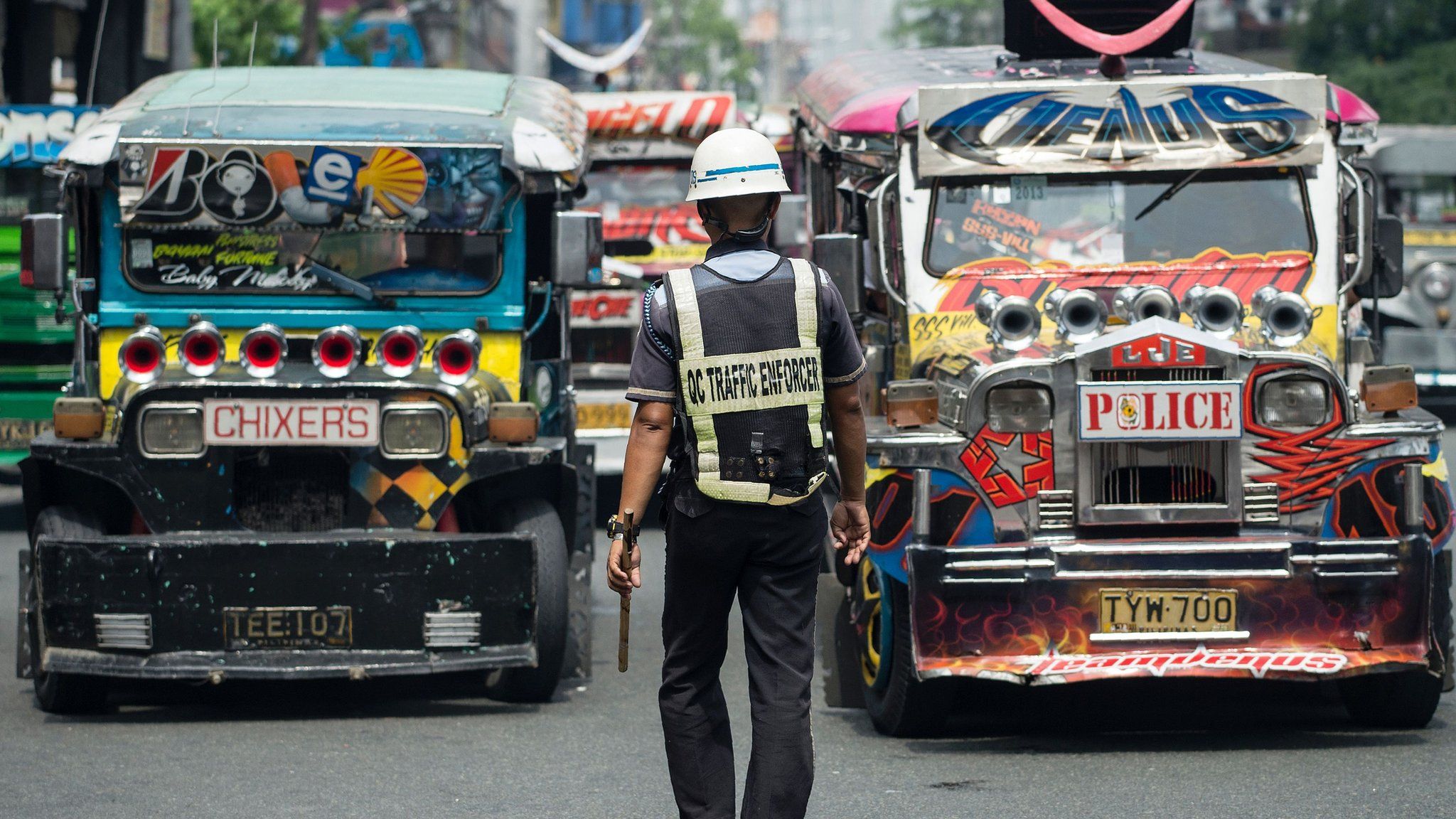 Jeepneys on a busy street in Manila
