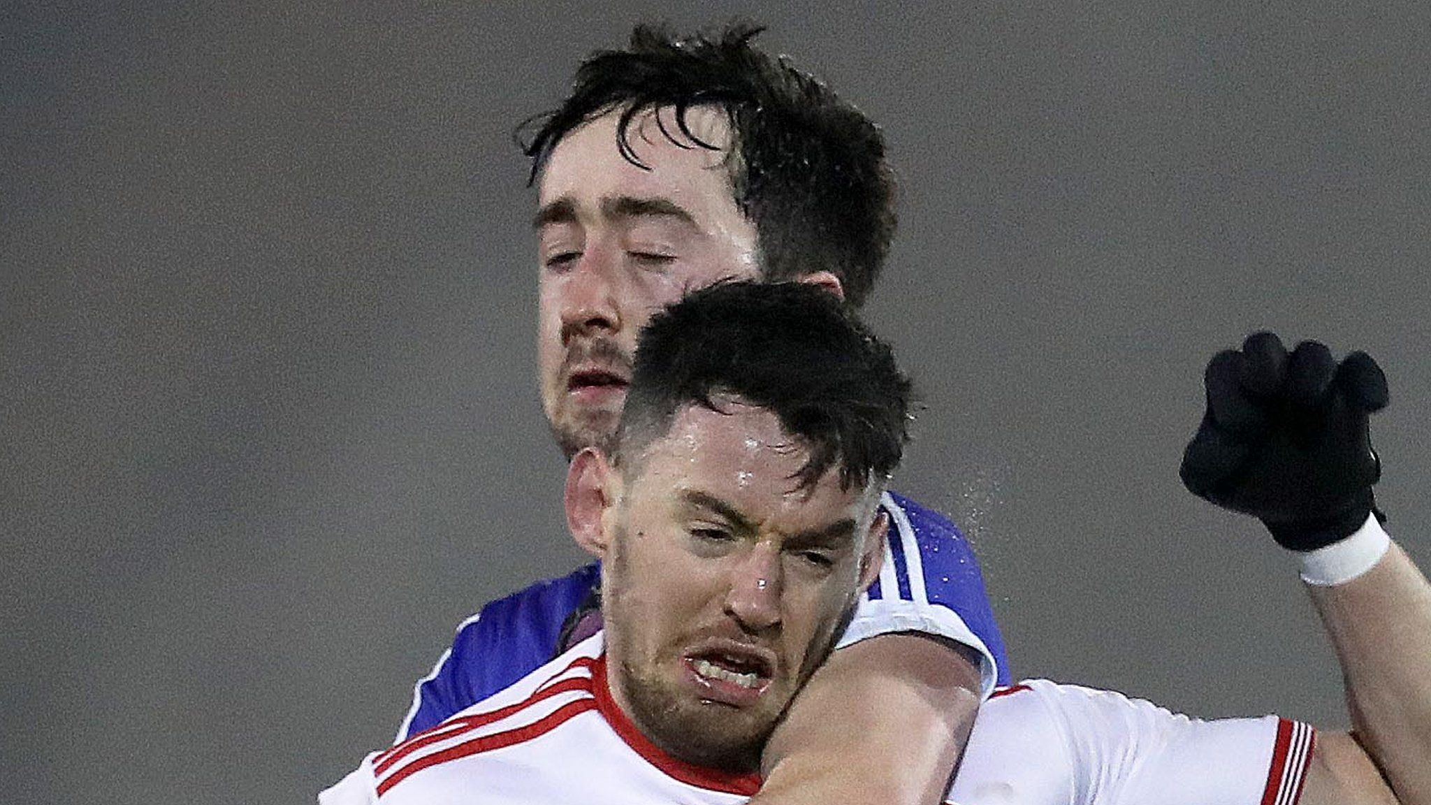 Cavan's Niall McKiernan battles with Tyrone's Mattie Donnelly