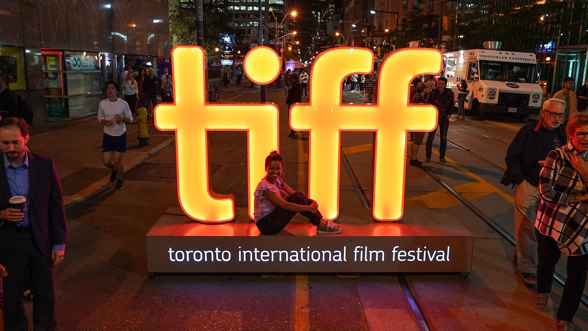 Tourist at the TIFF sign