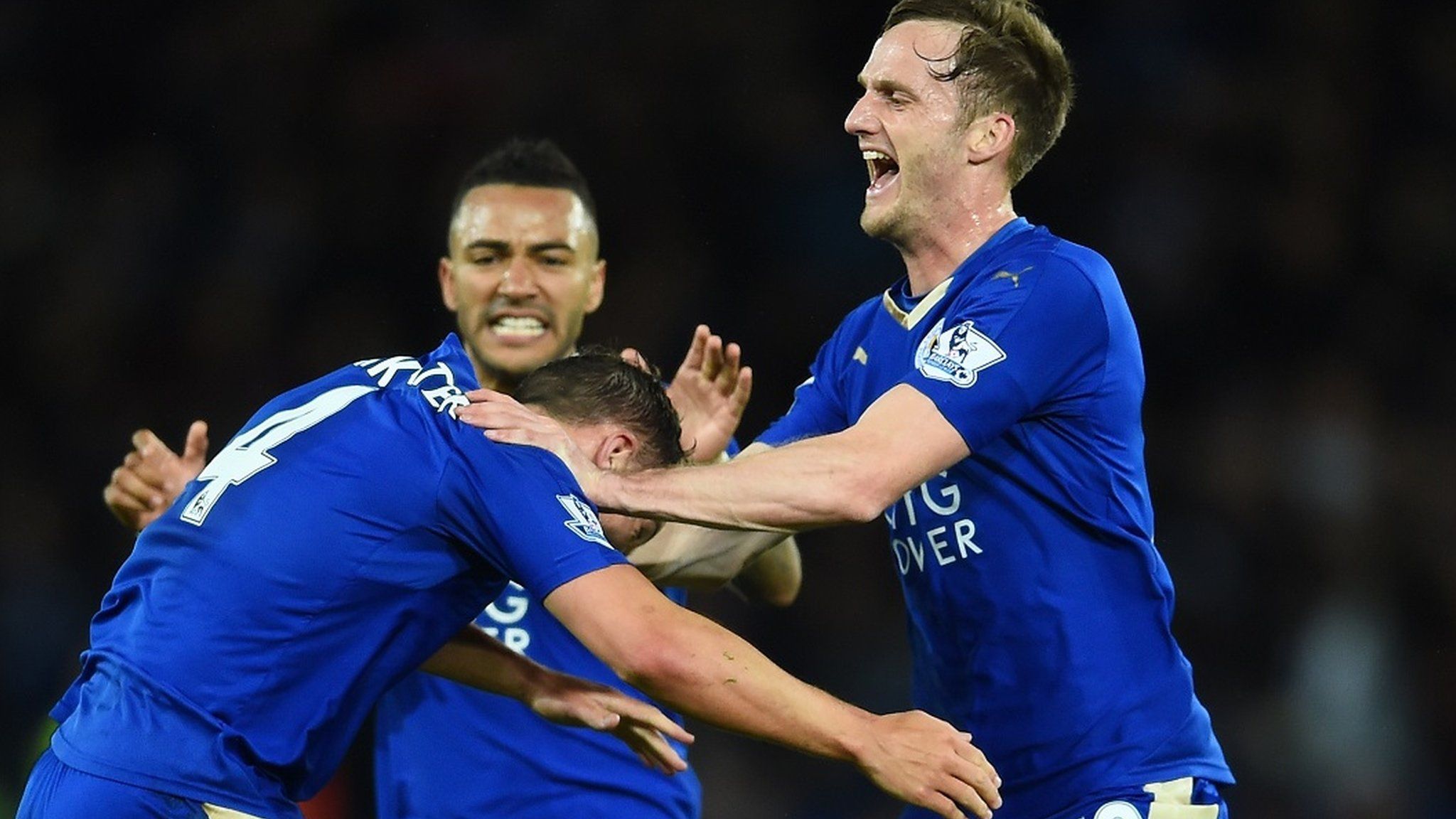 Andy King (right) celebrates a goal with Danny Simpson and Danny Drinkwater