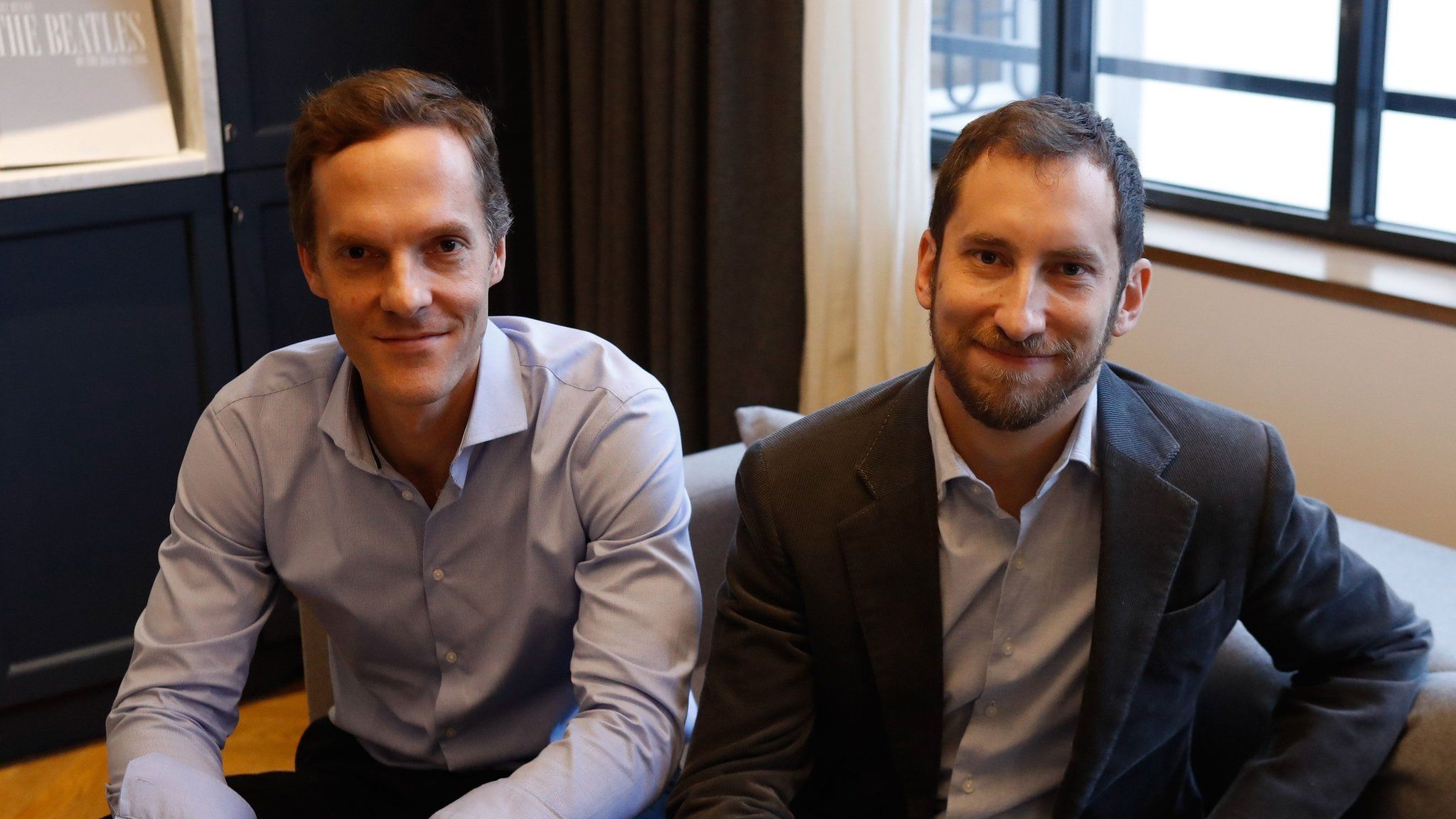 Co-founders of US start-up company Juul, Adam Bowen (L) and James Monsees pose in Paris on december 5, 2018.