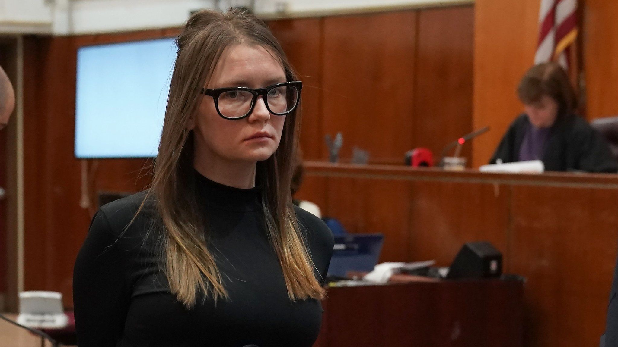 Fake German heiress Anna Sorokin is led away after being sentenced