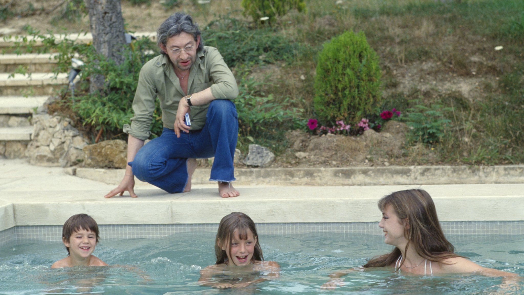 Jane Birkin on holiday in Saint-Tropez with her daughter Kate Barry, Sergei Gainsbourg and their baby daughter Charlotte in the 1970s