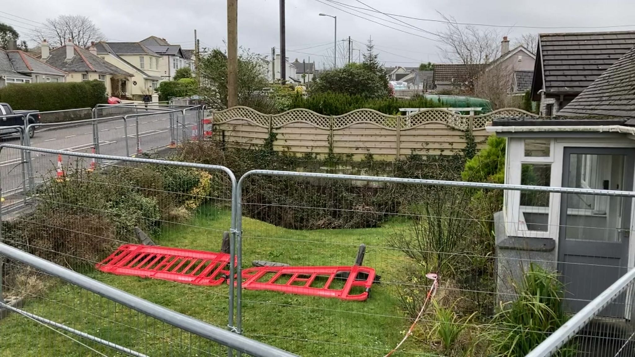 Part of garden collapsed into mineshaft and safety fencing