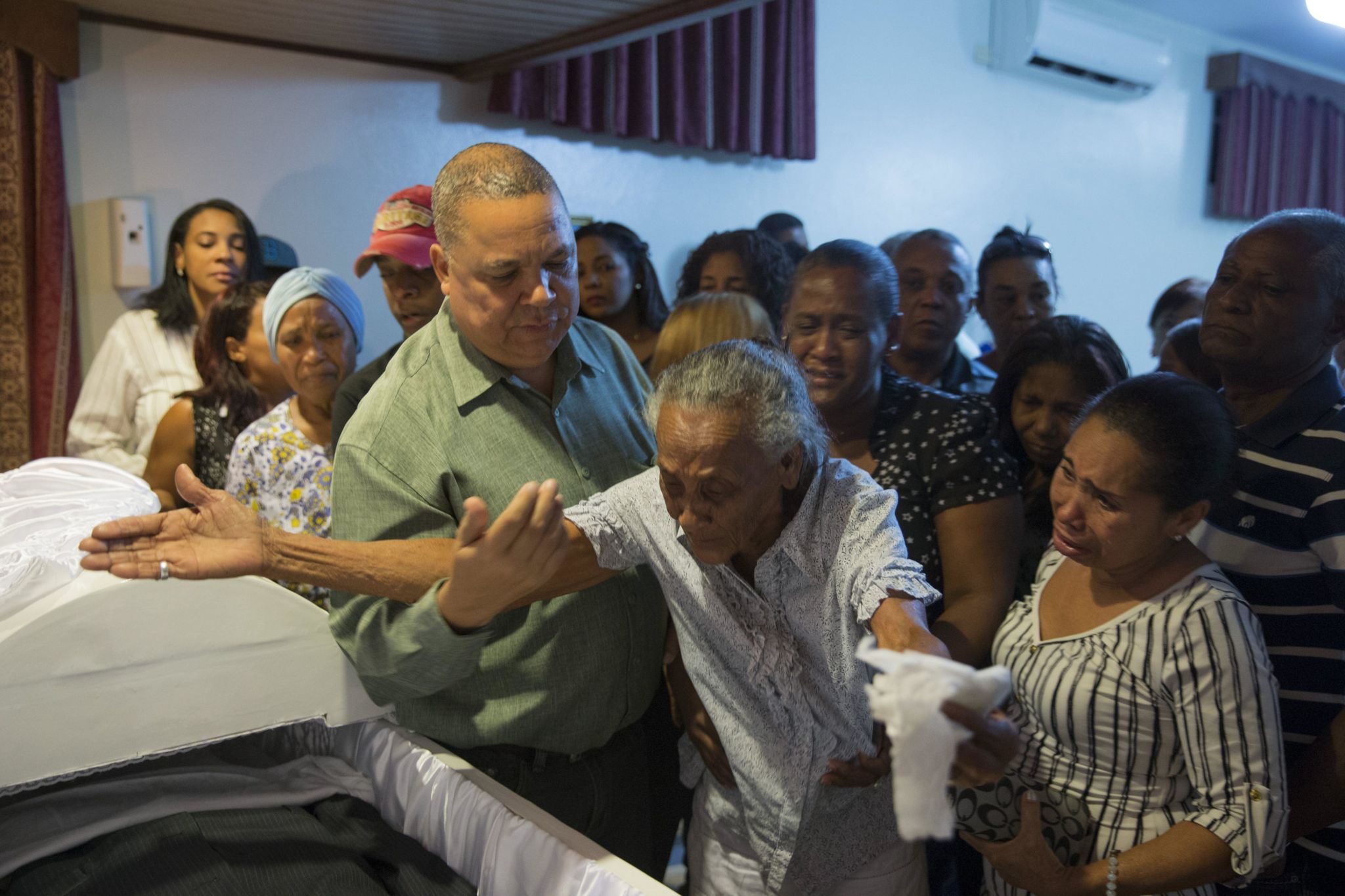 Family and friends mourn two murdered radio journalists in the Dominican Republic