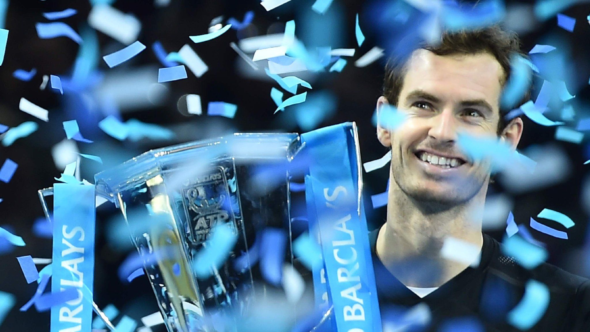 Andy Murray lifts the ATP World Tour Finals trophy