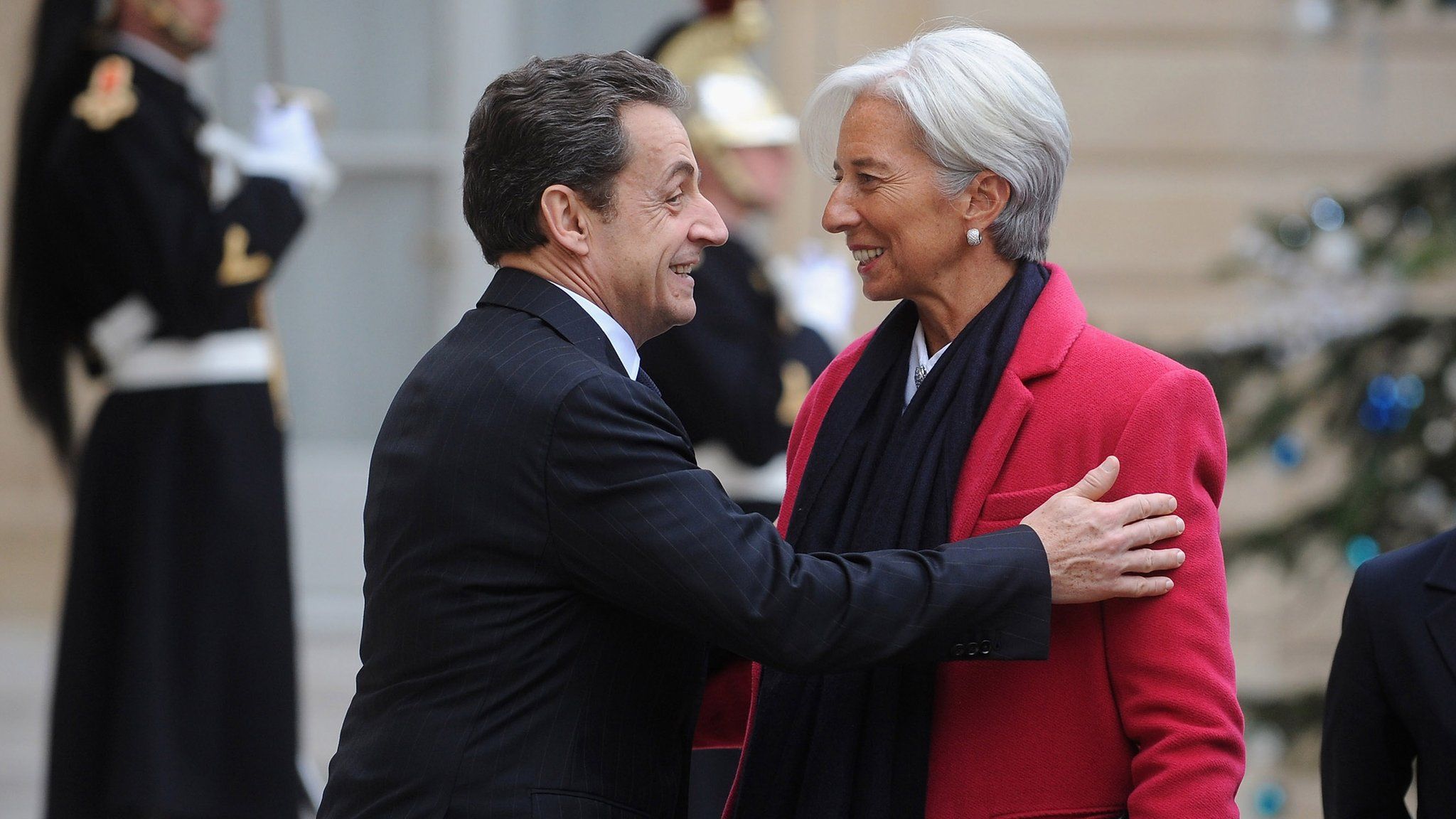 French President Nicolas Sarkozy (L) welcomes IMF chief Christine Lagarde at Elysee Palace on January 11, 2012 in Paris, France.