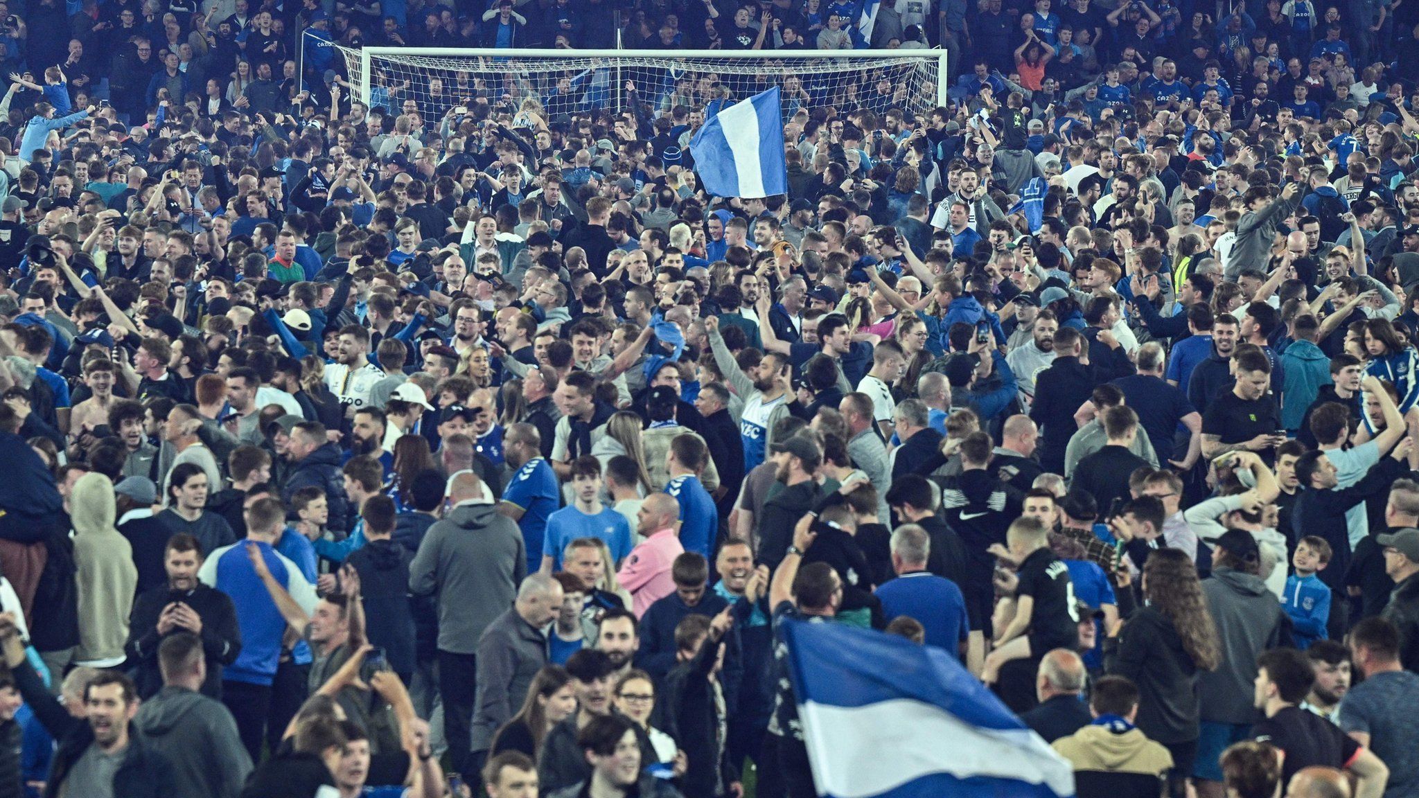 Everton fans invade the pitch