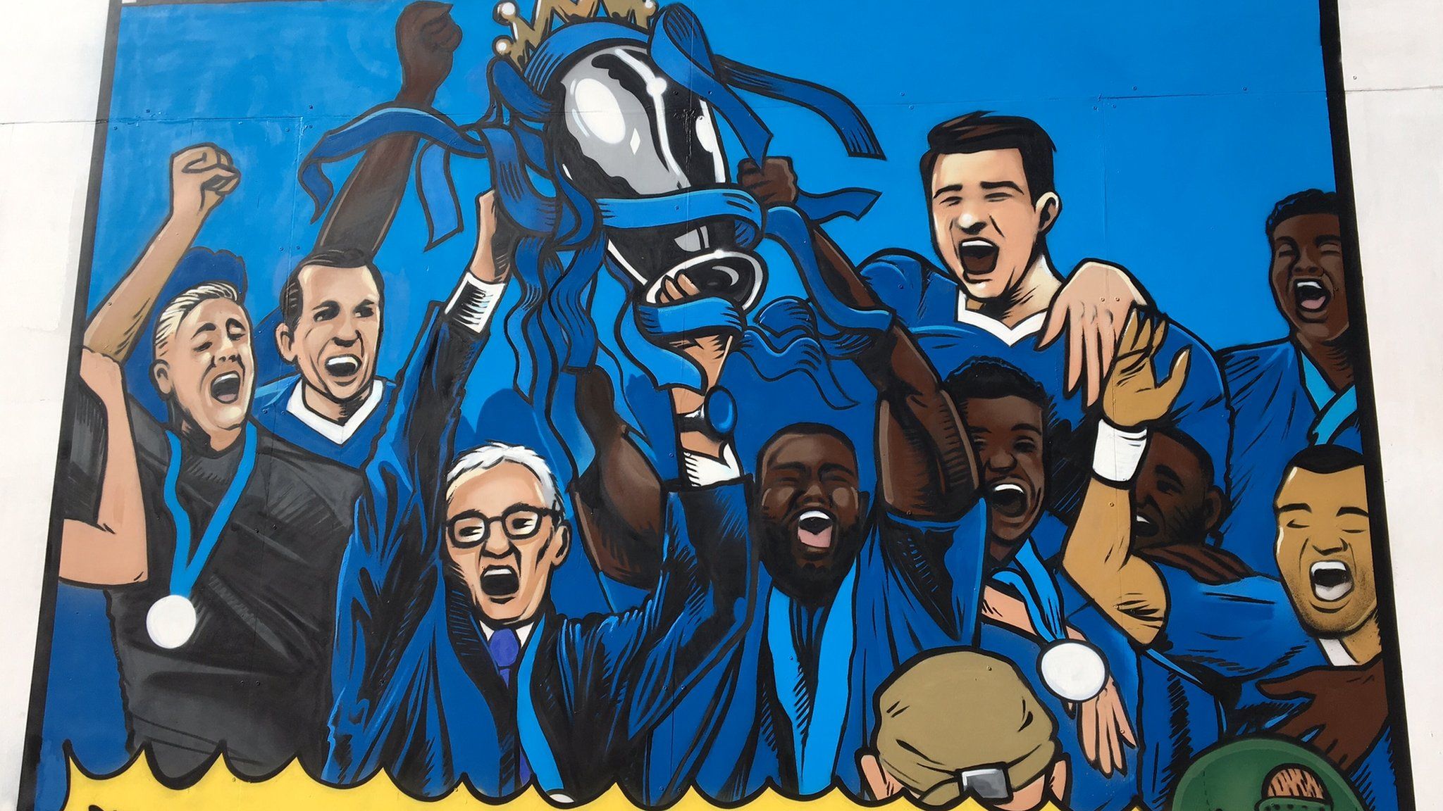 Leicester lifting the Premier League trophy in art form