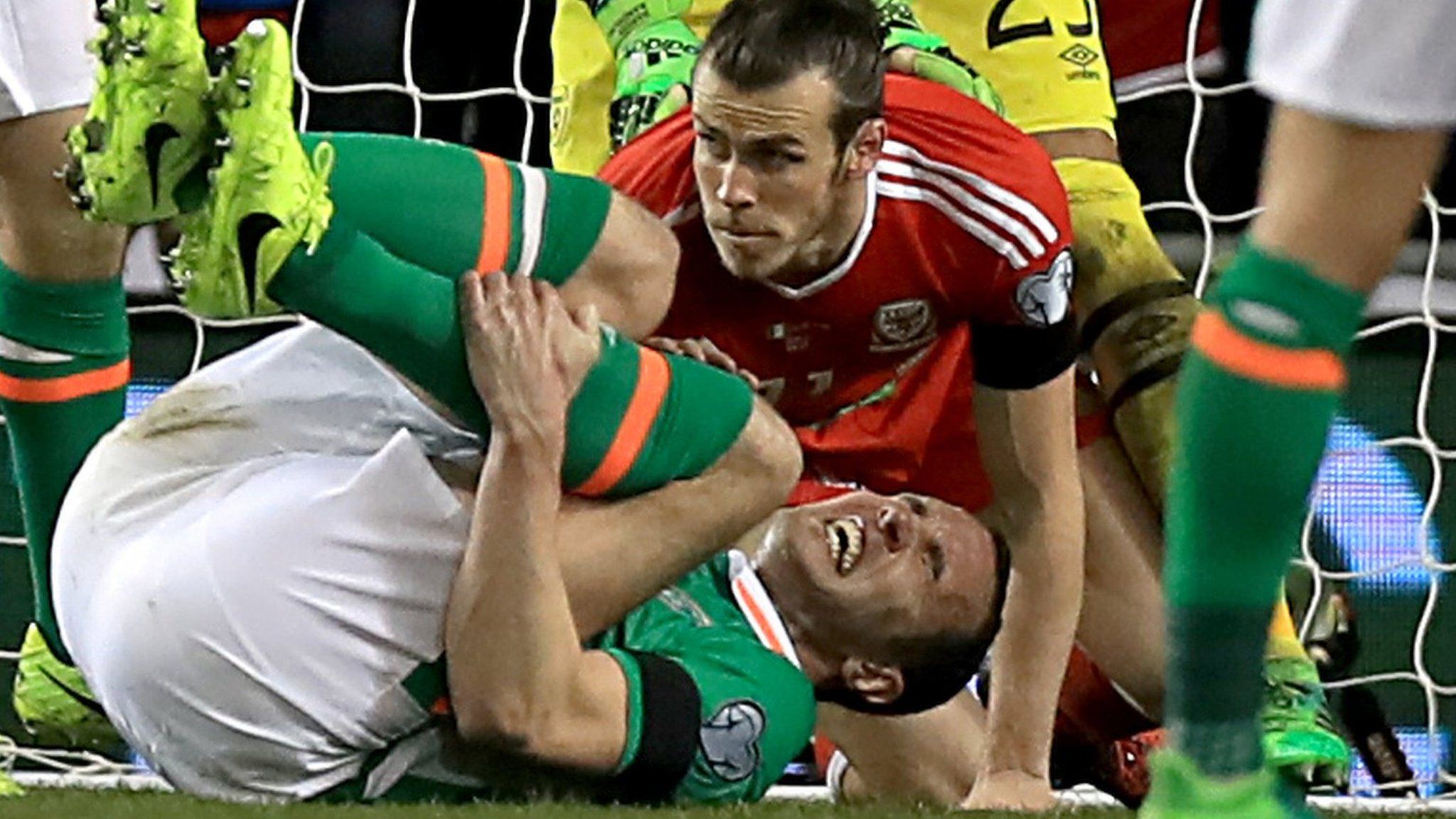 John O'Shea looks in severe pain after the tackle by Gareth Bale