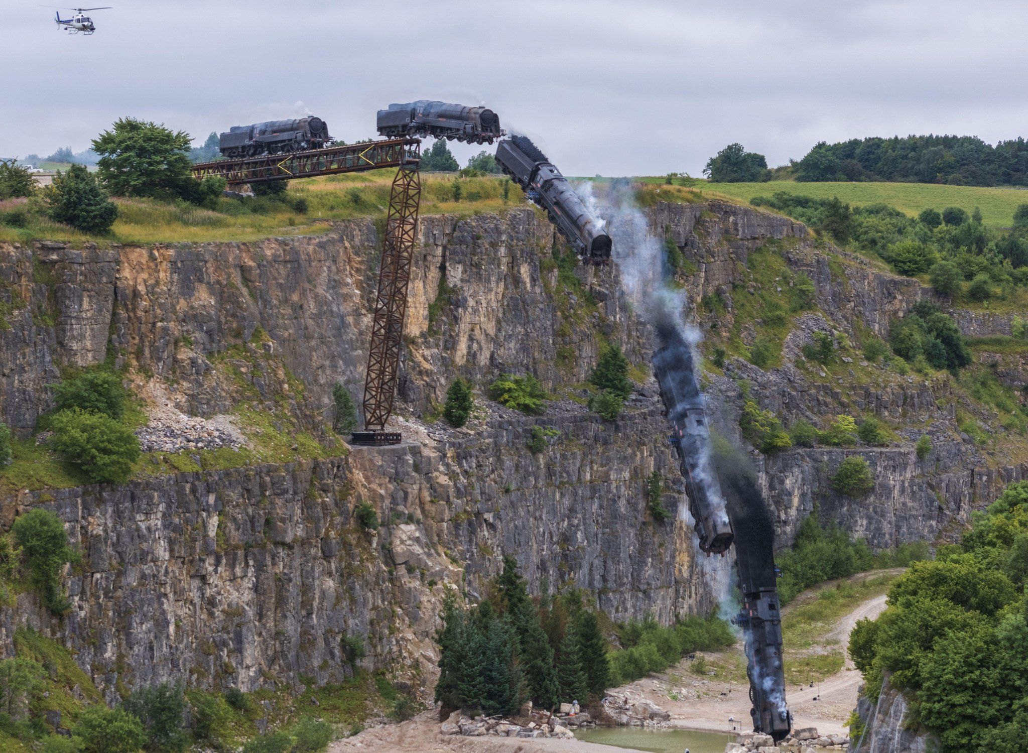 A train plunges down a ravine in North Yorkshire during filming for Mission: Impossible 7