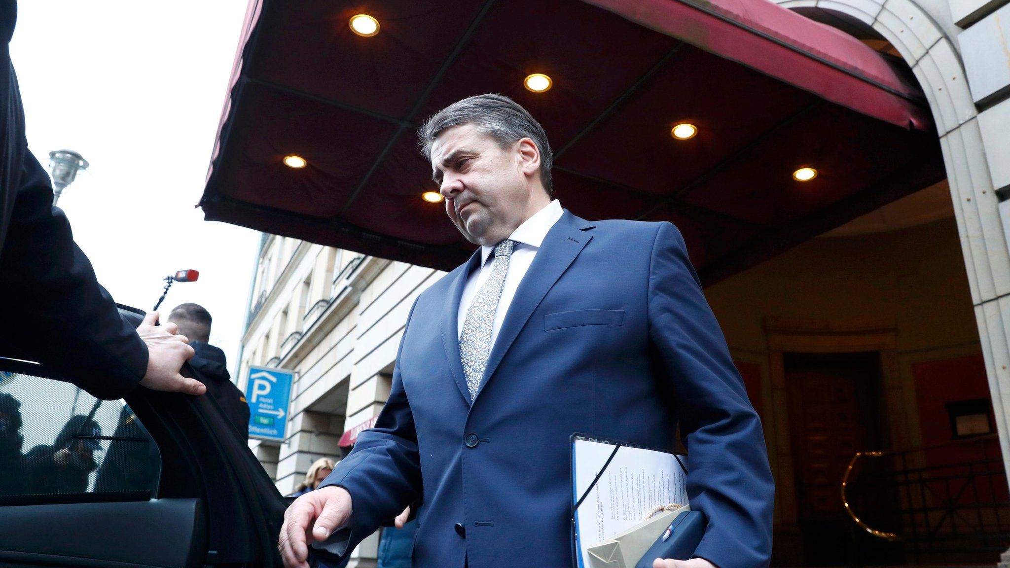 German Foreign Minister Sigmar Gabriel leaves Adlon hotel after meeting Turkish Foreign Minister Mevlut Cavusoglu in Berlin, Germany, 8 March 2017