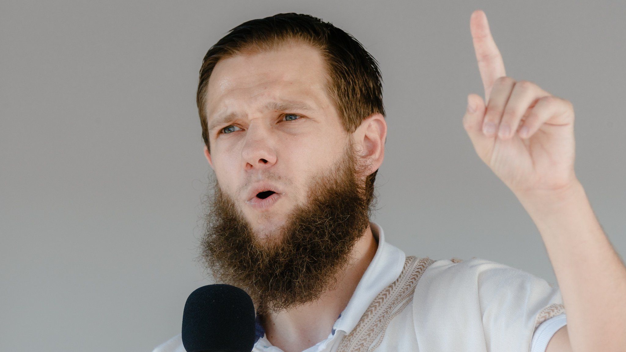 German Islamist Sven Lau delivers a speach during a rally in Hamburg, northern Germany, on 19 July 2014