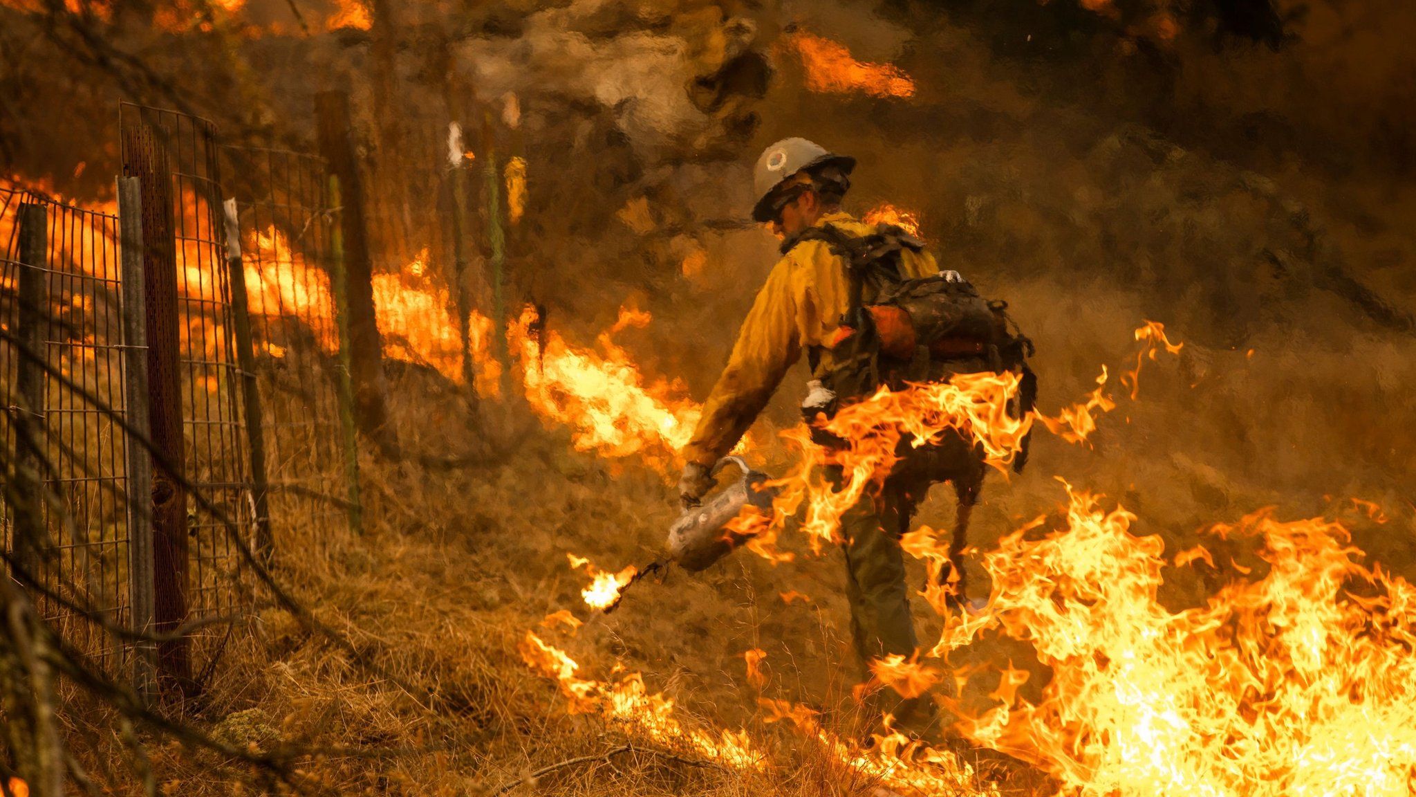 A firefighter battles the Kincade Fire in California on 26 October, 2019