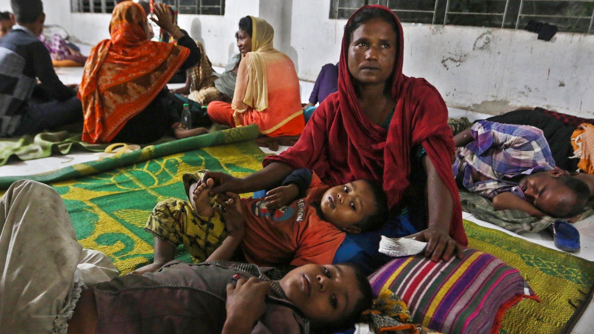 Bangladeshi villagers take refuge in a cyclone shelter following an evacuation by authorities in the coastal villages of the Cox"s Bazar district on May 29, 2017 as Cyclone "Mora" gradually approaches towards the coastline
