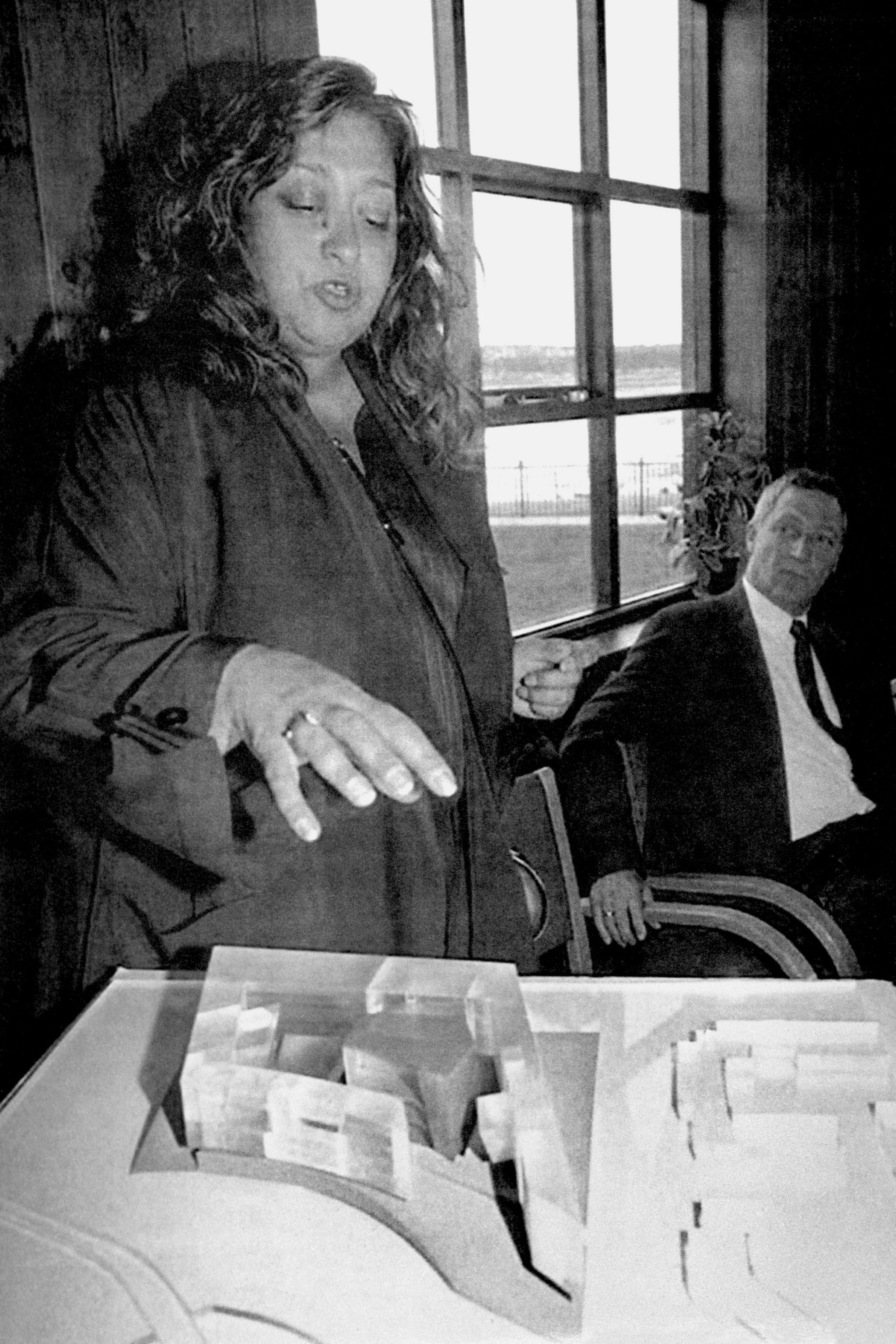 Zaha Hadid in 1994 with a model of her design for a Cardiff Bay opera house