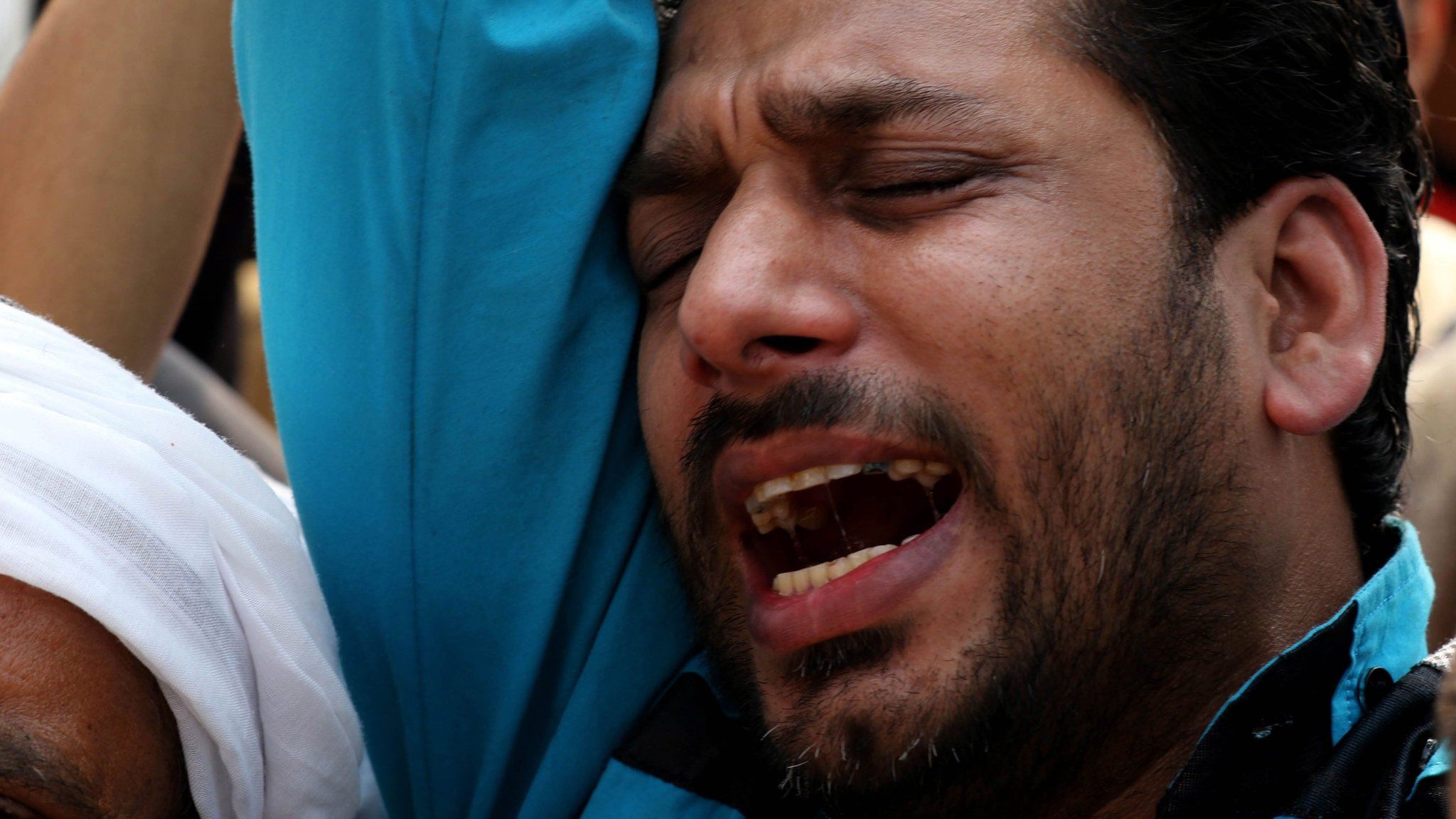 A protester in Lahore after Qadri was hanged, Pakistan, 29 February 2016
